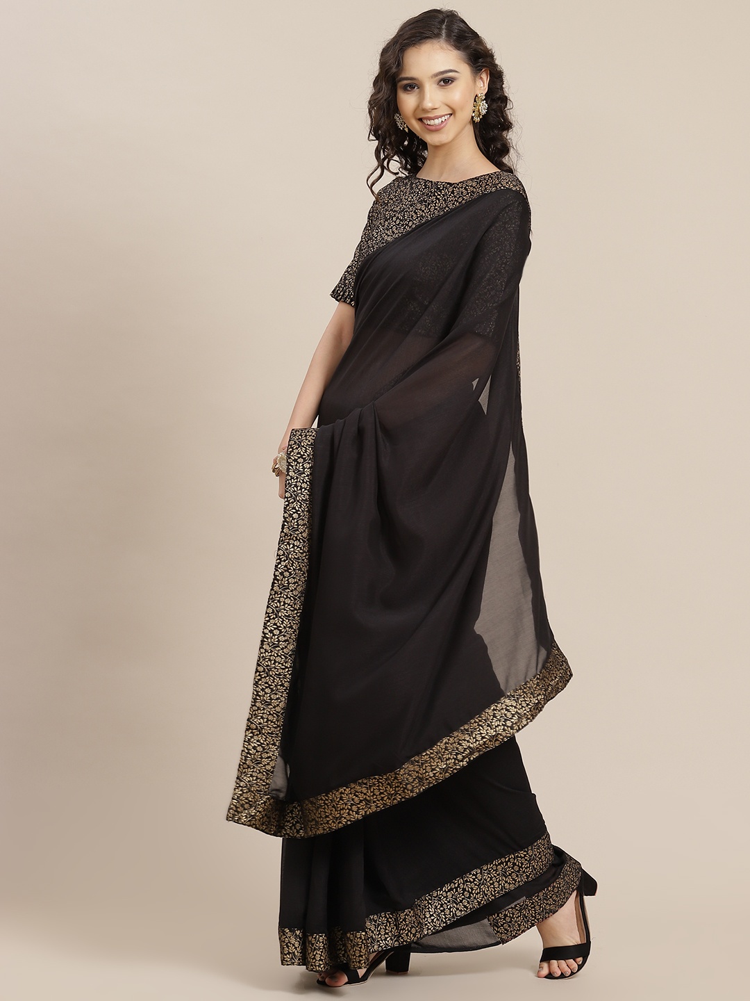 

Inddus Black Solid Zari Silk Blend Saree