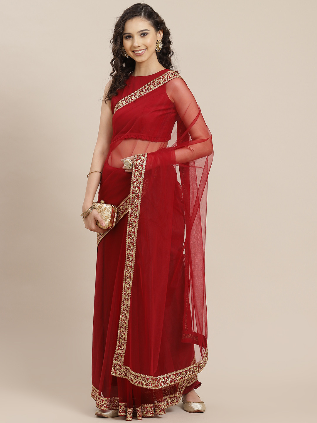 

Inddus Maroon Solid Net Saree