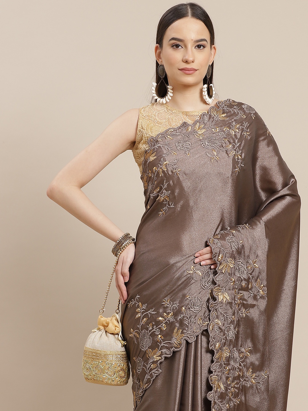 

Anouk Taupe & Golden Solid Satin Saree With Embroidered Border