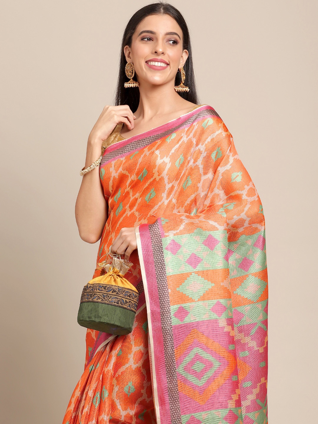 

Anouk Orange & Cream-Coloured Ethnic Motifs Print Jute Silk Saree