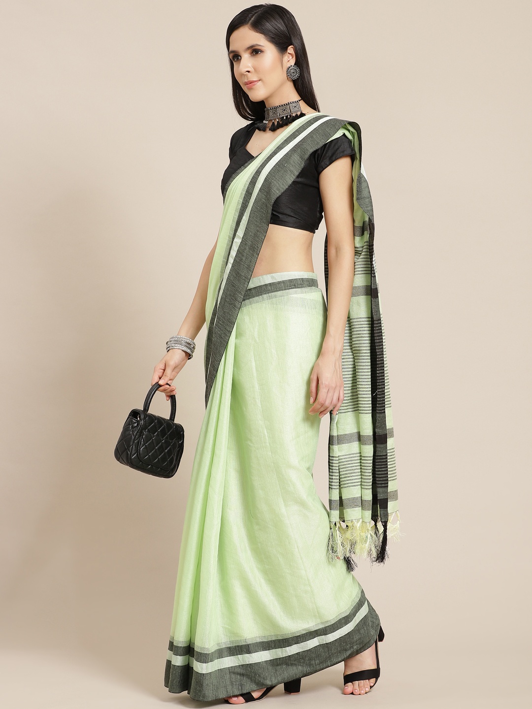 

Anouk Green Solid Saree