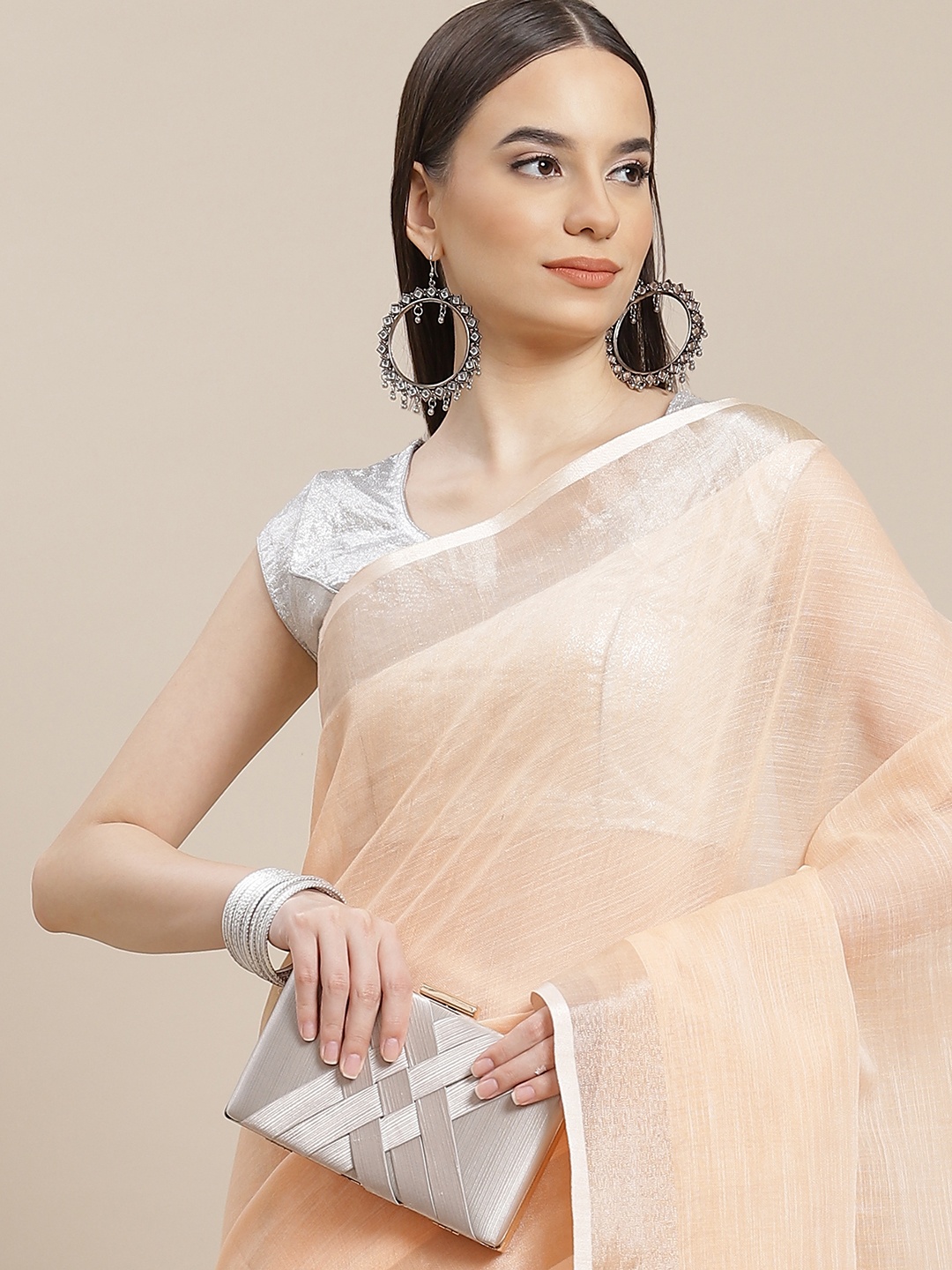 

Anouk Peach-Coloured Solid Linen Blend Saree