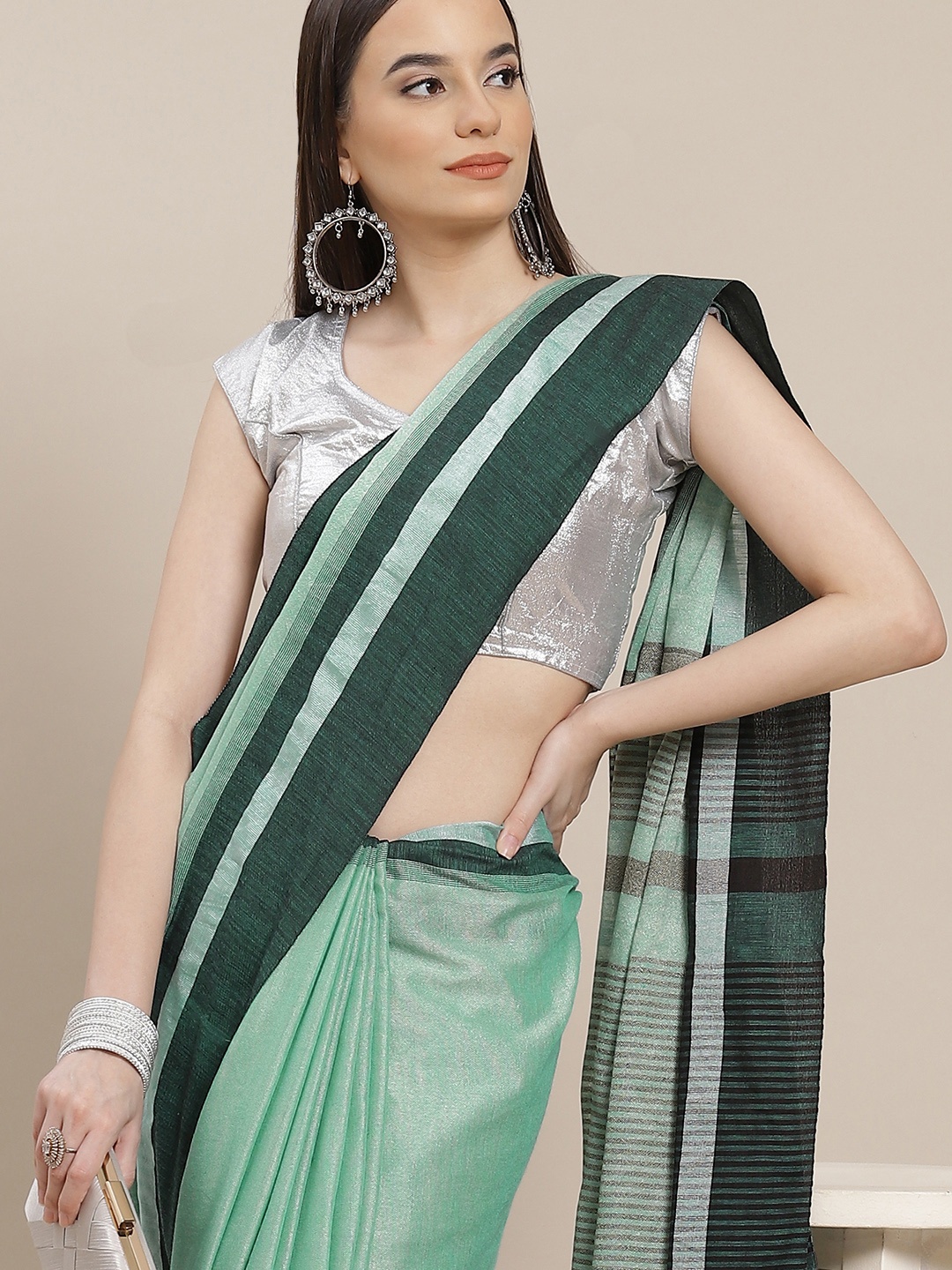 

Anouk Green Solid Saree