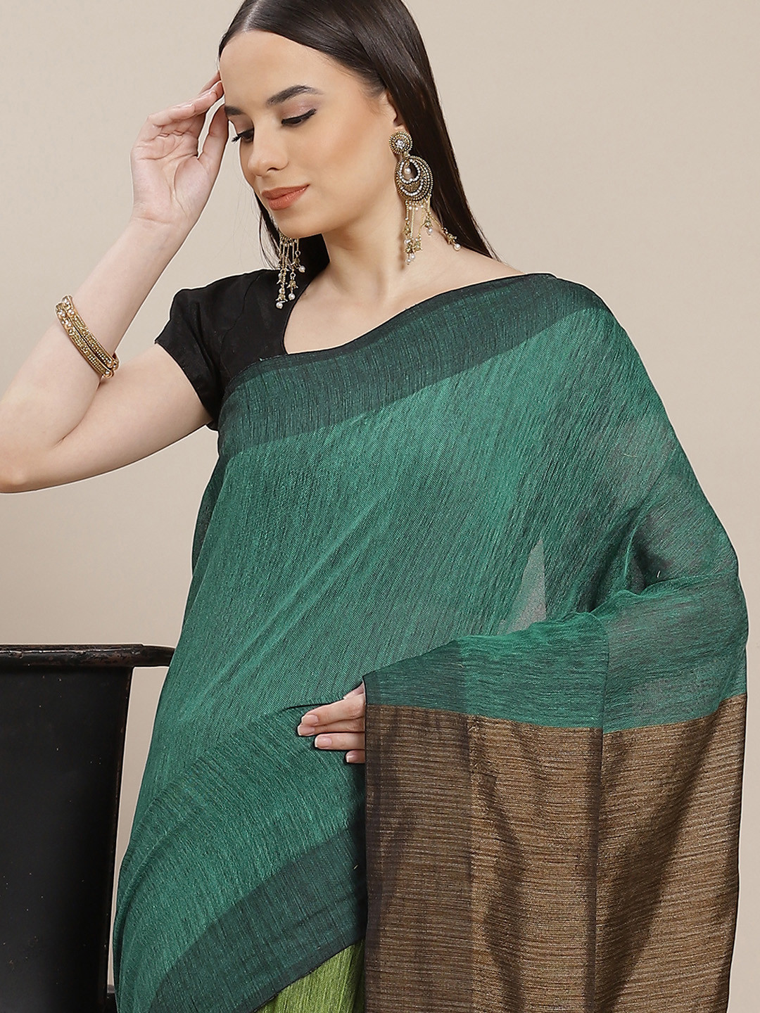 

Anouk Green & Brown Colourblocked Saree