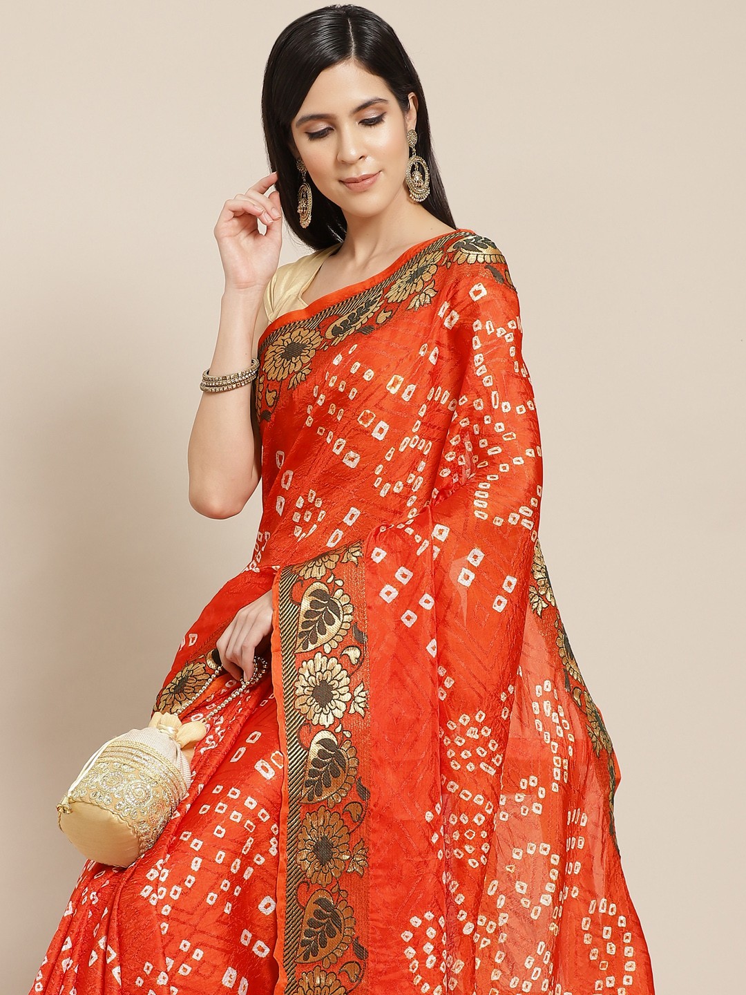 

Anouk Orange & White Bandhani Print Saree