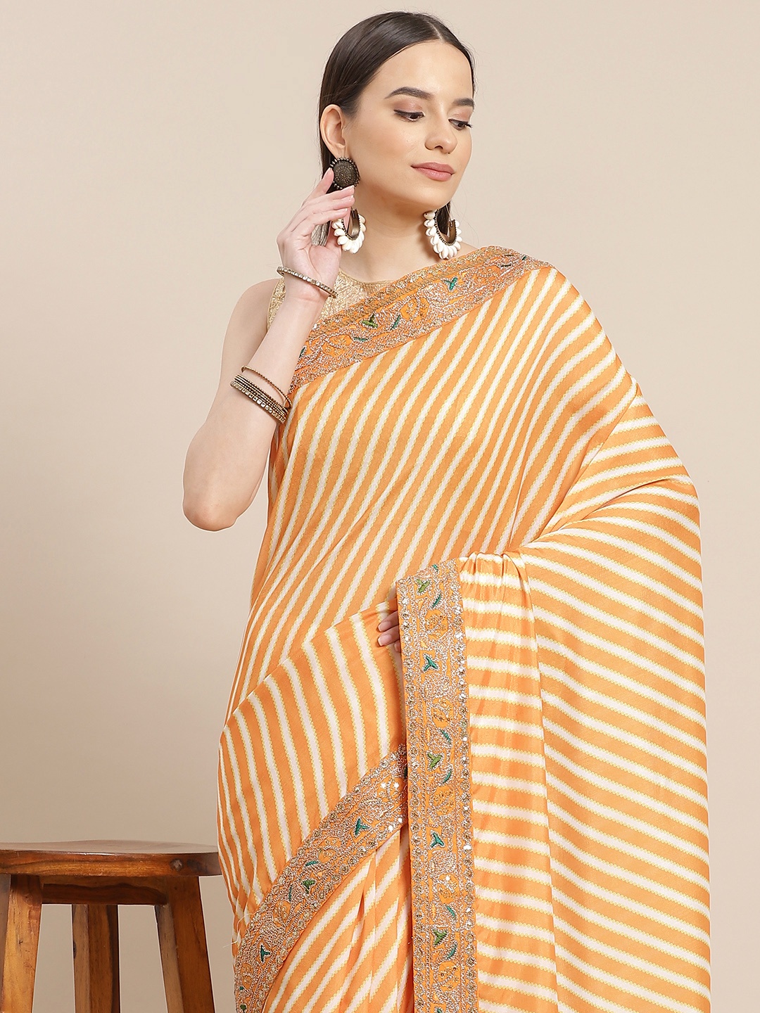 

Anouk Mustard Yellow & Cream-Coloured Leheriya Saree