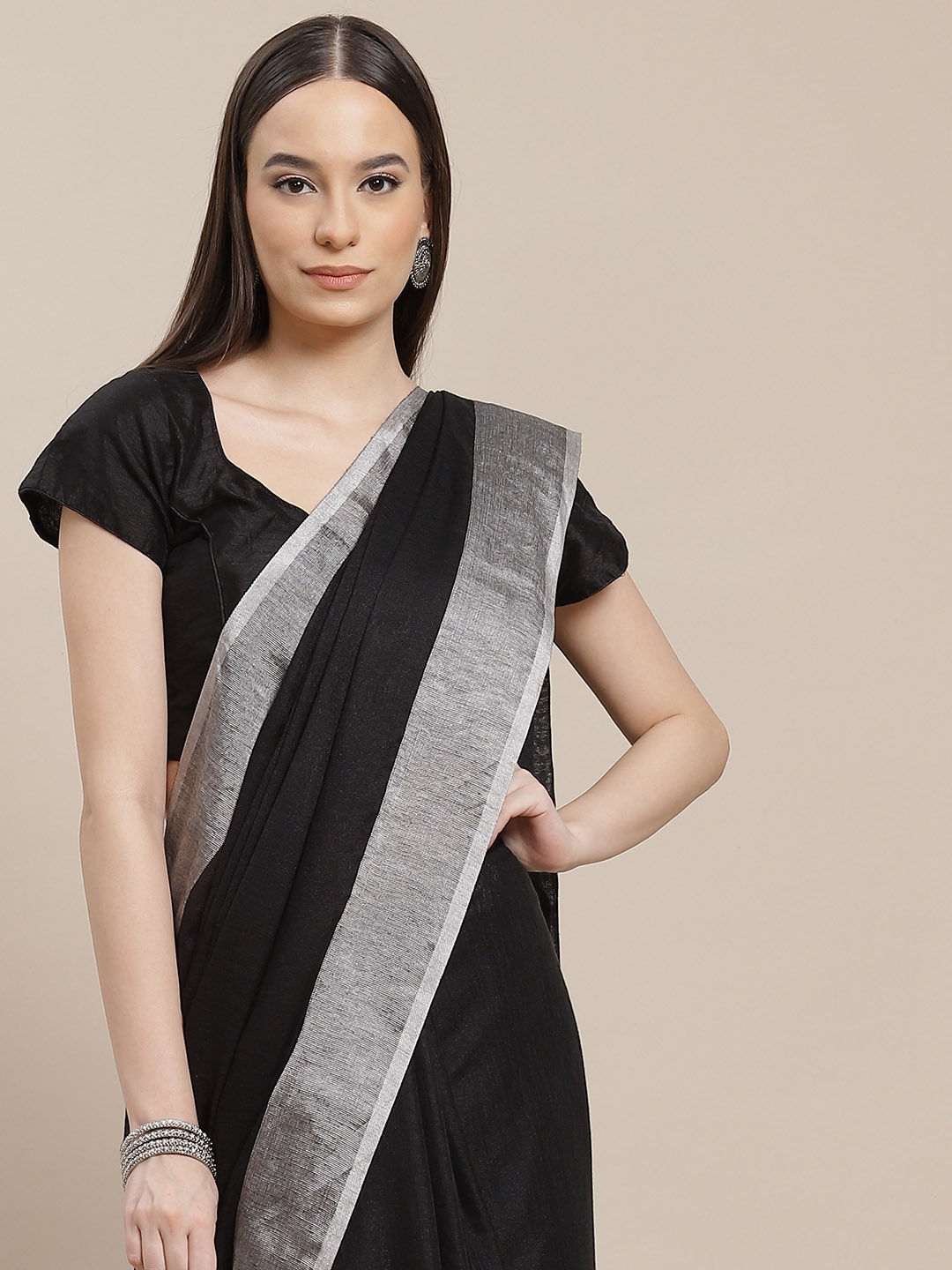

Anouk Black Solid Saree