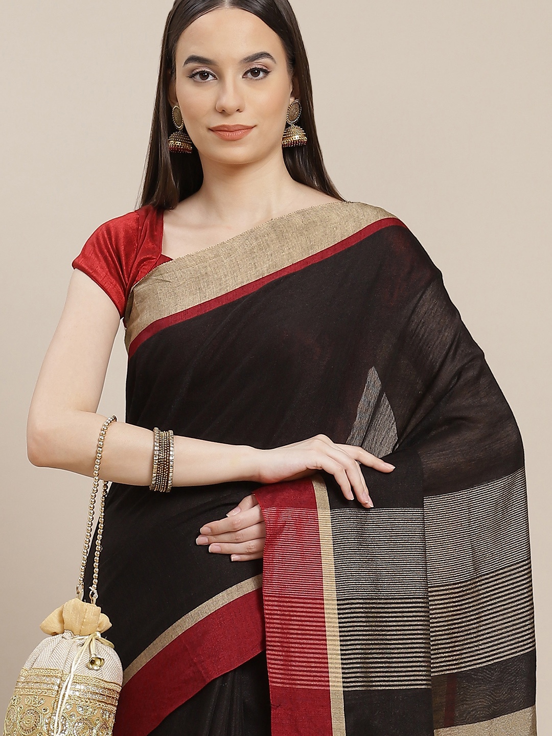 

Anouk Black Solid Linen Blend Saree