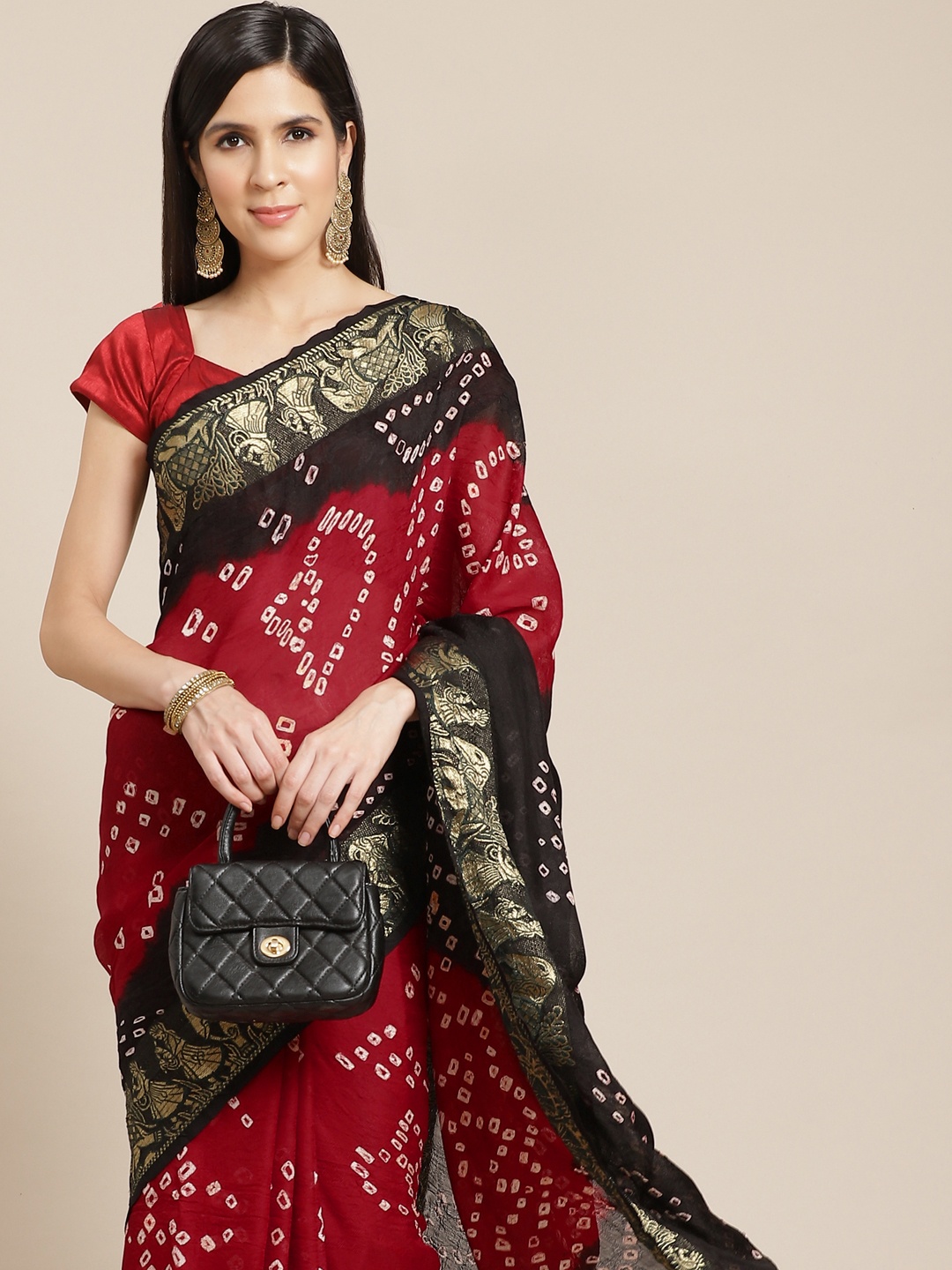 

Anouk Maroon & White Bandhani Printed Saree