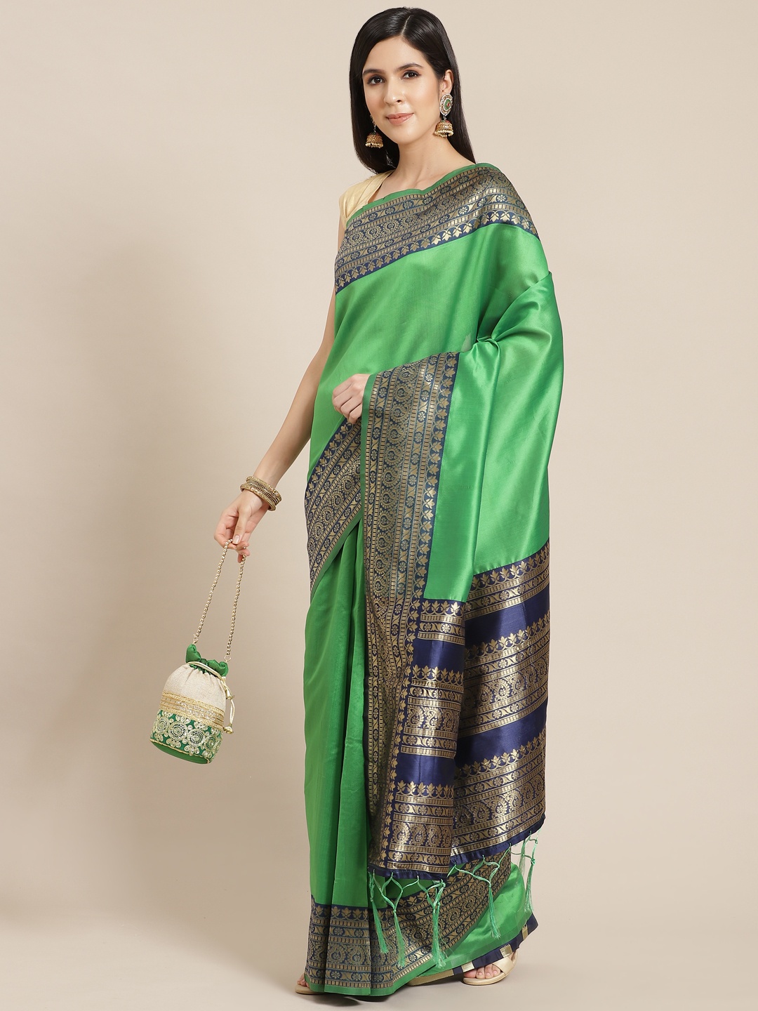 

Anouk Green Solid Banarasi Saree
