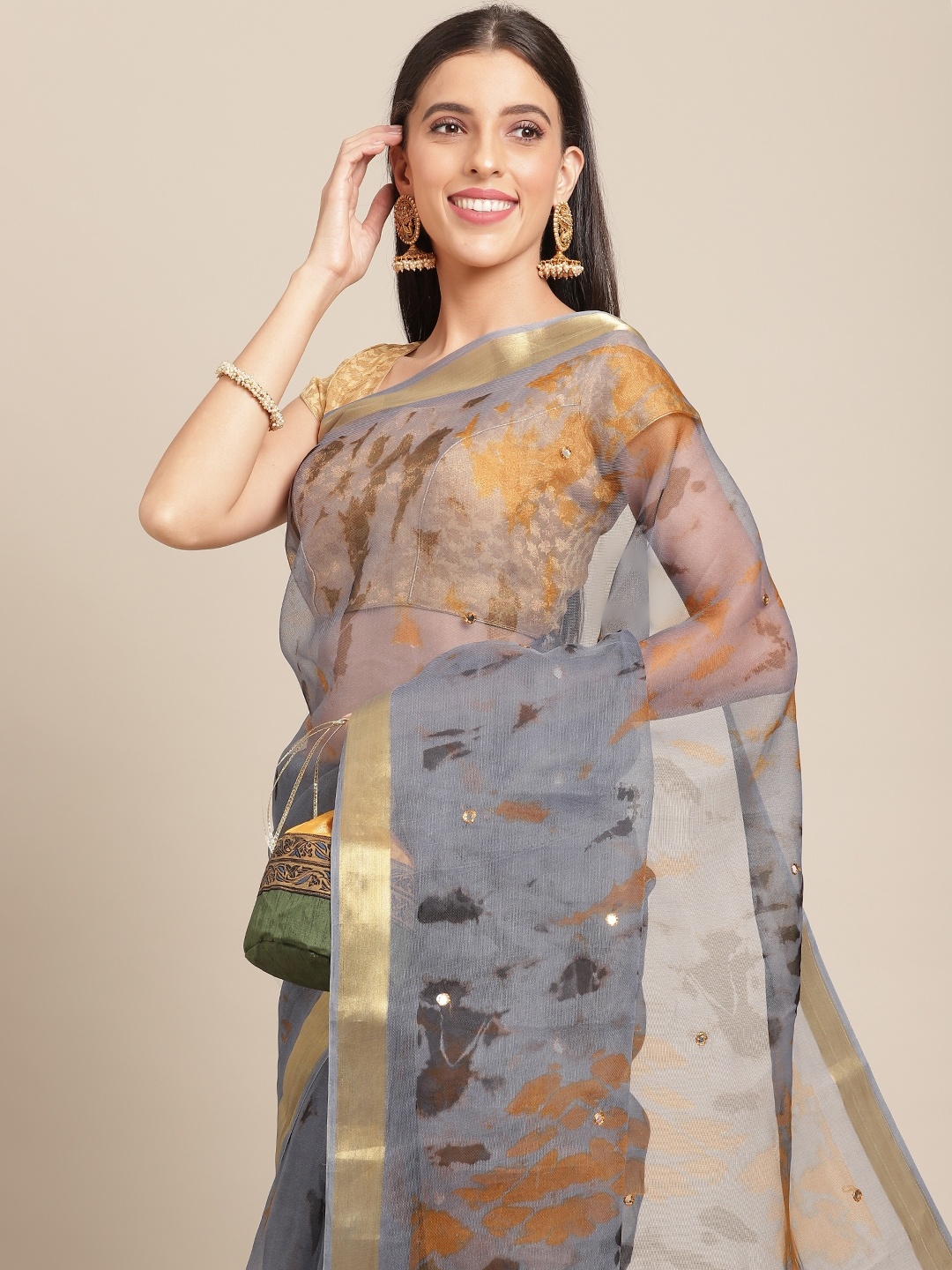 

Anouk Grey & Golden Embellished Mirror Work Organza Saree