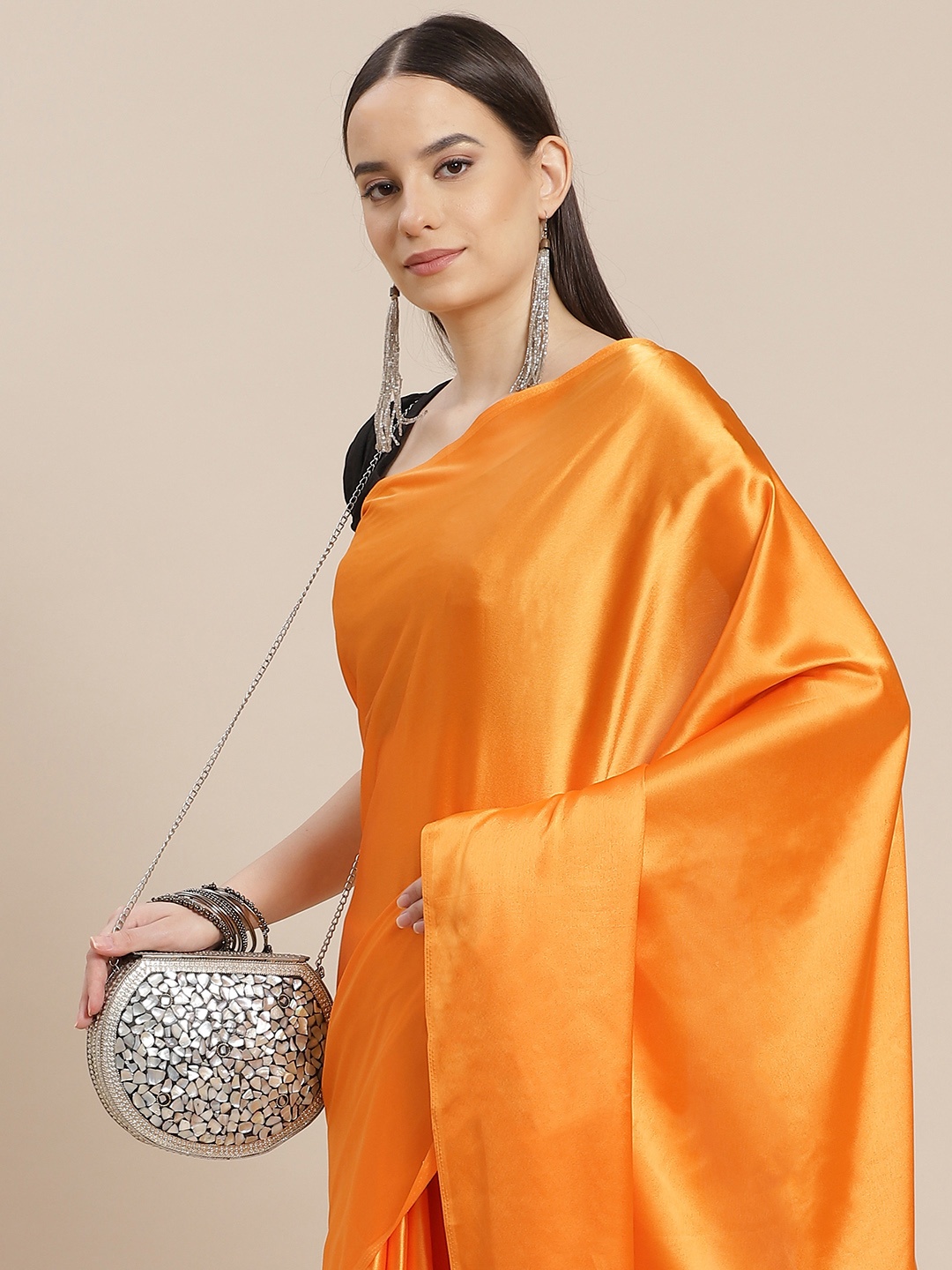 

Anouk Women Orange Solid Satin Saree