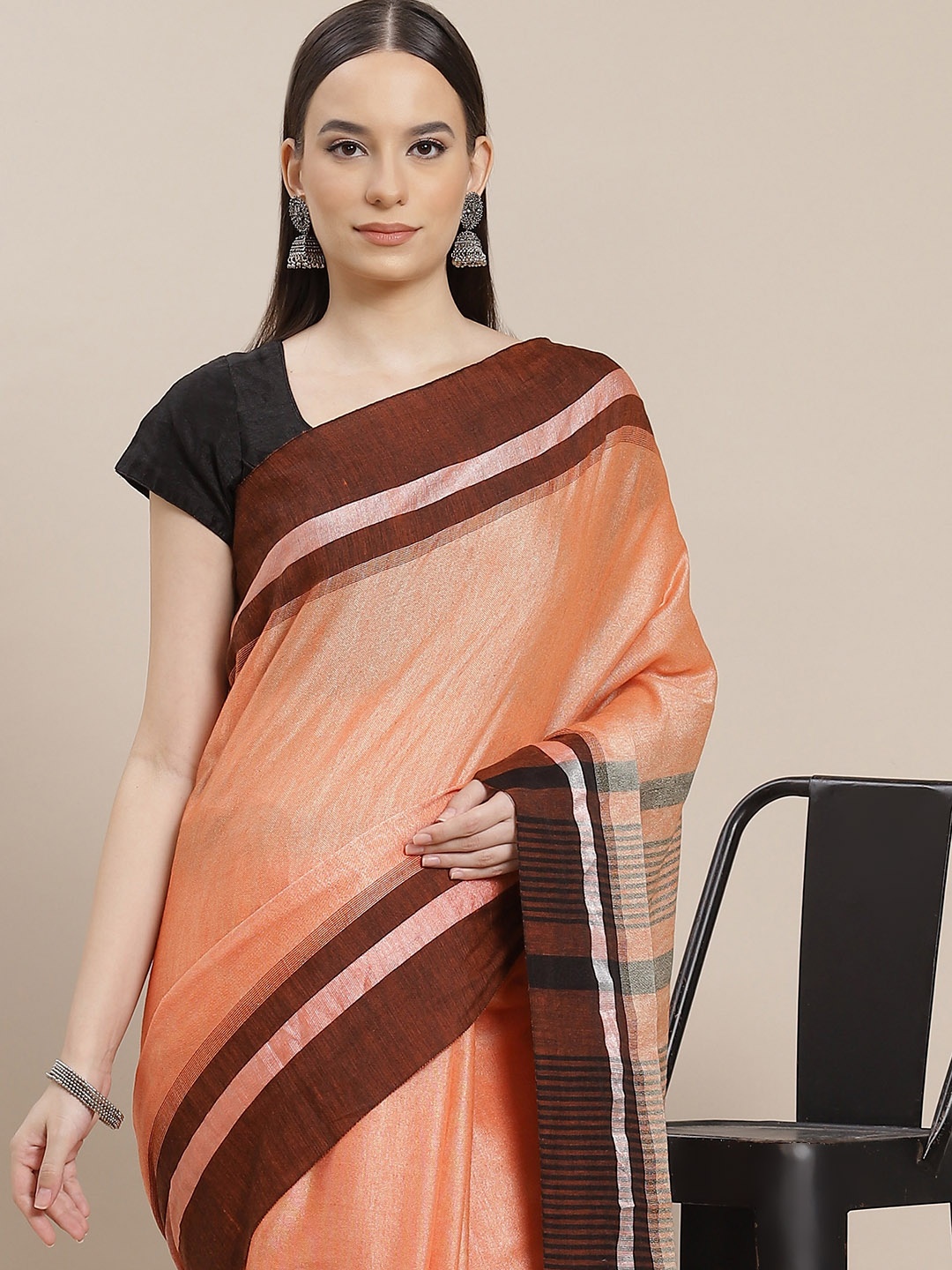 

Anouk Peach-Coloured & Brown Linen Blend Saree