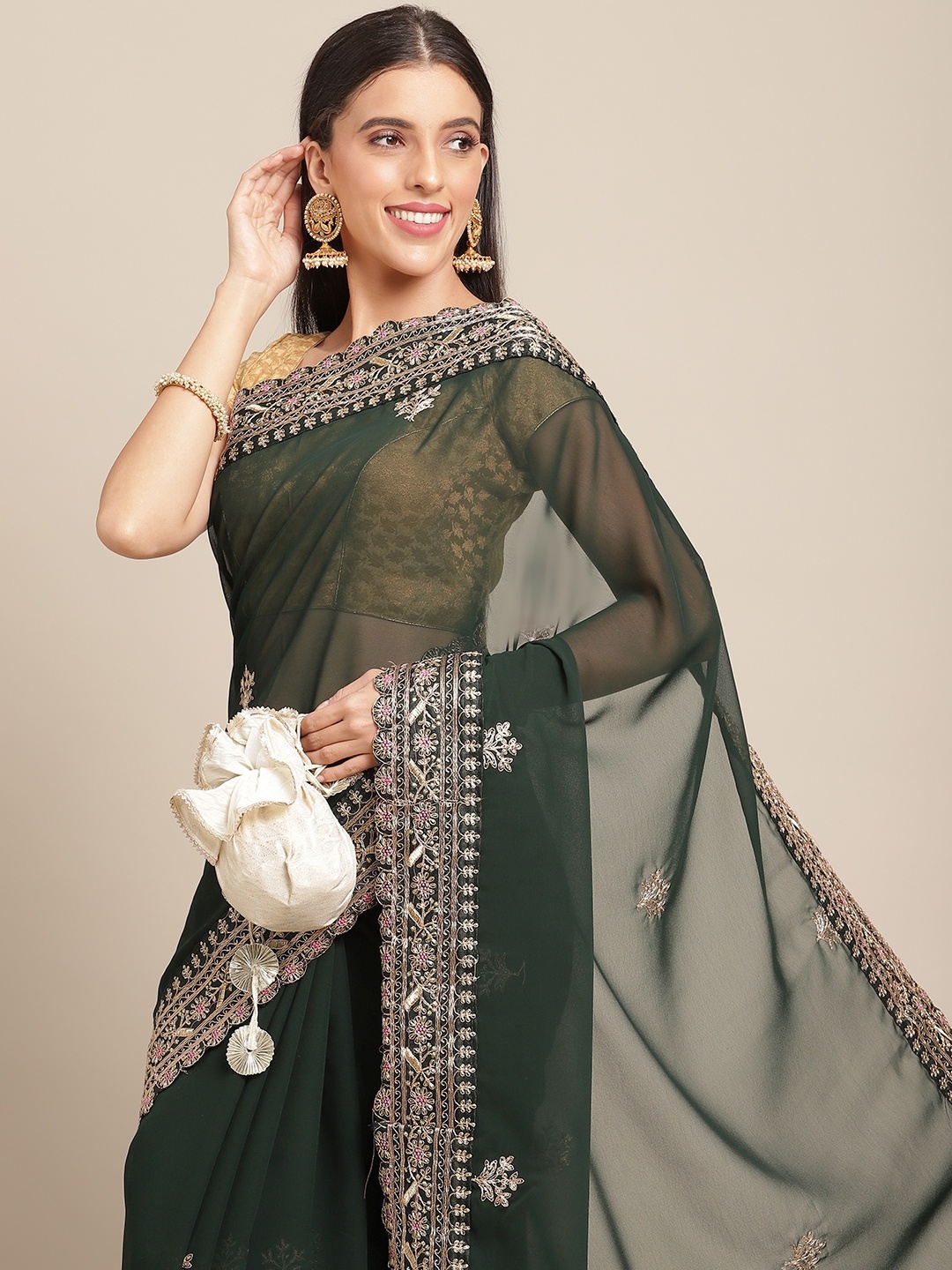 

Anouk Green & Golden Woven Design Georgette Saree