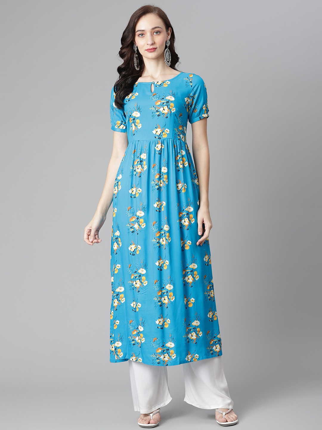 

Poshak Hub Women Blue & Yellow Ethnic Motifs Printed Keyhole Neck Kurta