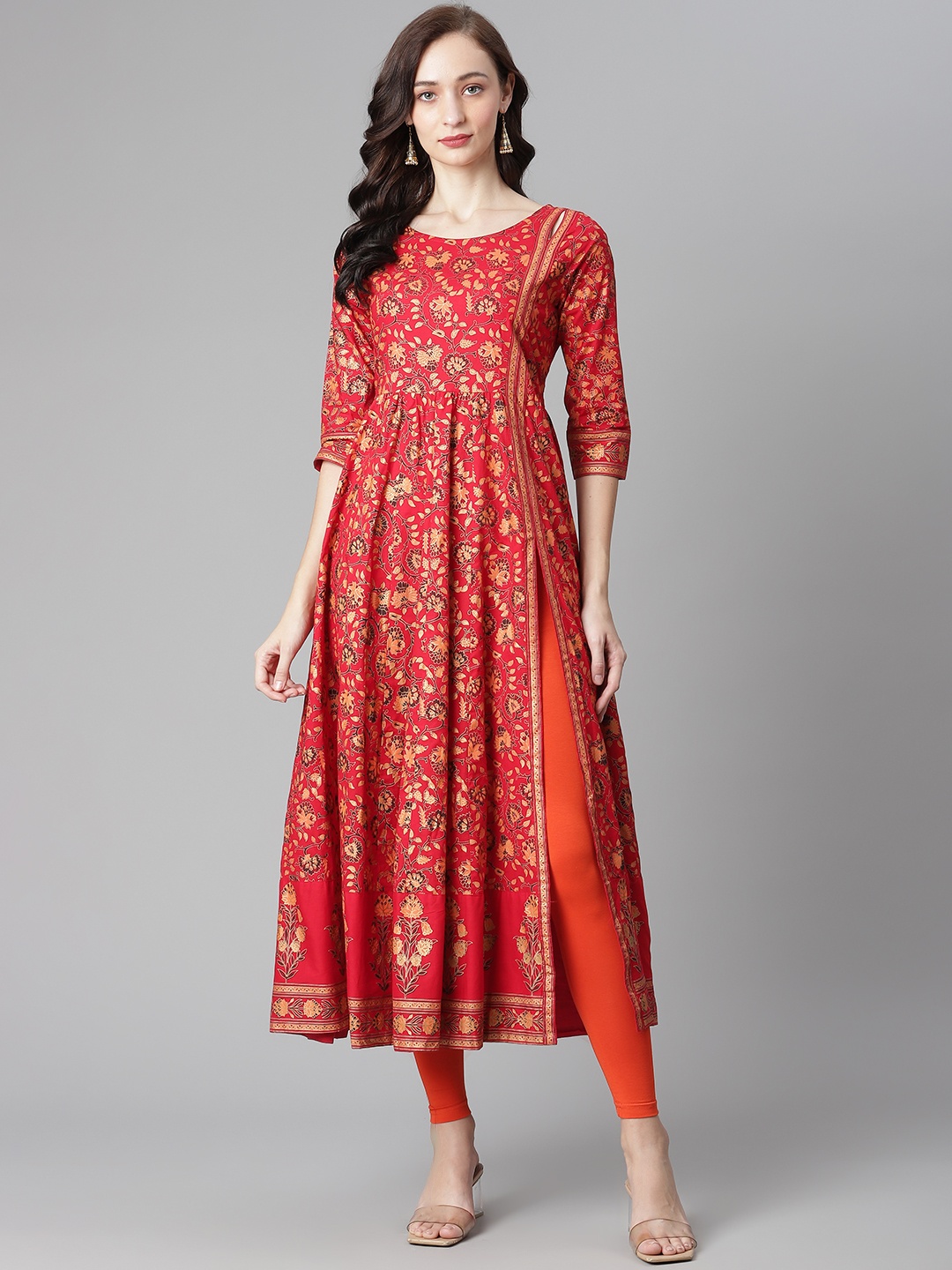 

Poshak Hub Women Orange & Golden Printed High Slit Pure Cotton Kurta with Leggings