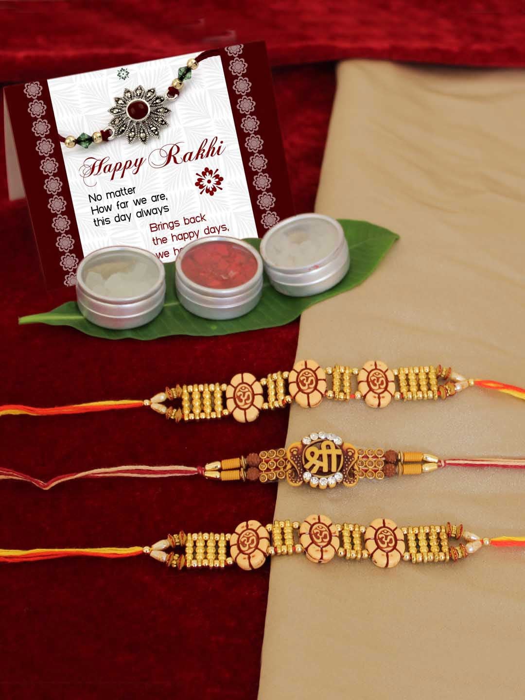 

TIED RIBBONS Set of 3 Multicoloured Rakhis with Greeting Cards & Roli Chawal Combo, Multi