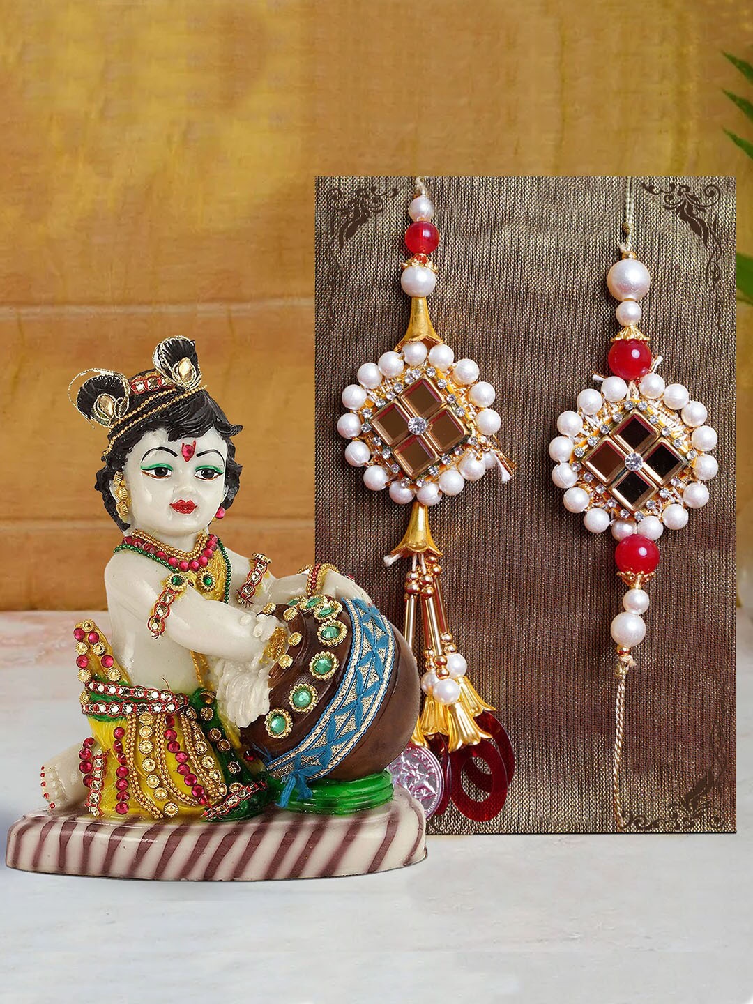 

TIED RIBBONS Multicoloured Bhaiya Bhabhi Lumba Rakhi with Krishna Idol Combo Gift Set, Multi