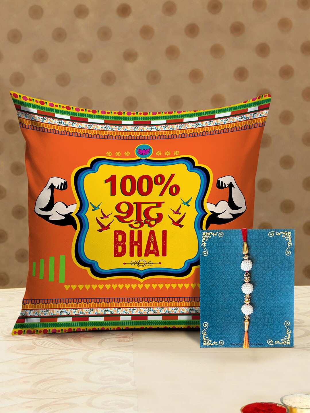 

TIED RIBBONS Multicoloured Rakhi with Printed Cushion & Roli Chawal Gift Pack, Multi