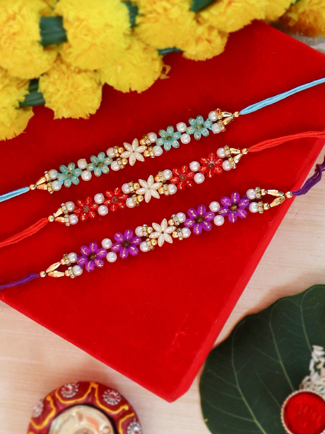 

TIED RIBBONS Set of 3 Men Floral Rakhi with Card & Roli Chawla, Multi