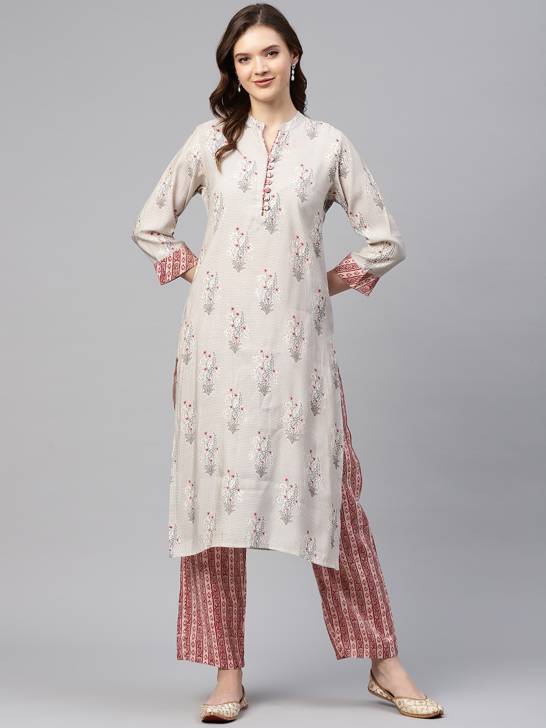 

Readiprint Fashions Women Off White & Red Ethnic Motifs Print Kurta with Trousers