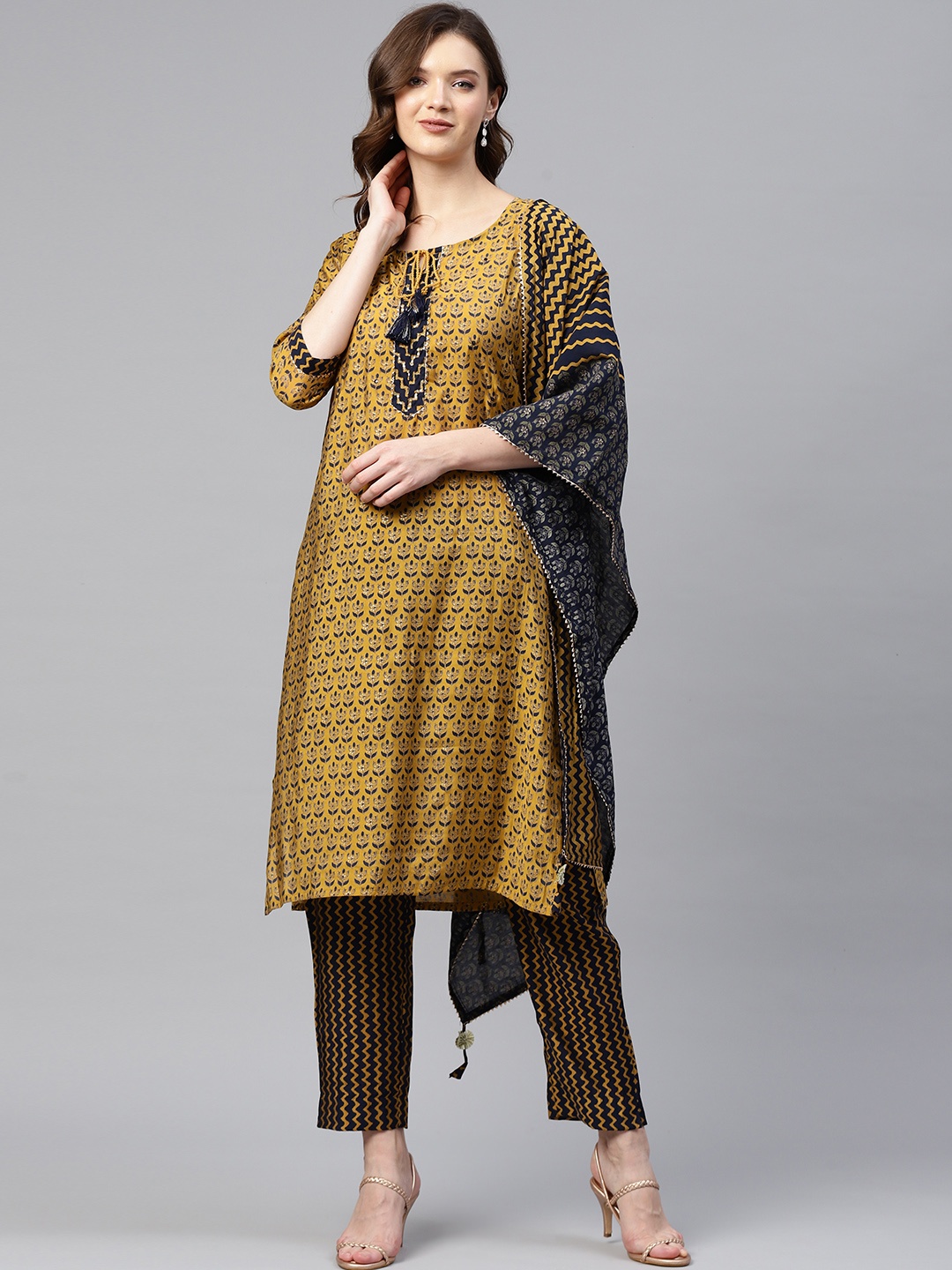 

Readiprint Fashions Women Mustard Yellow & Navy Blue Printed Kurta with Trousers & Dupatta