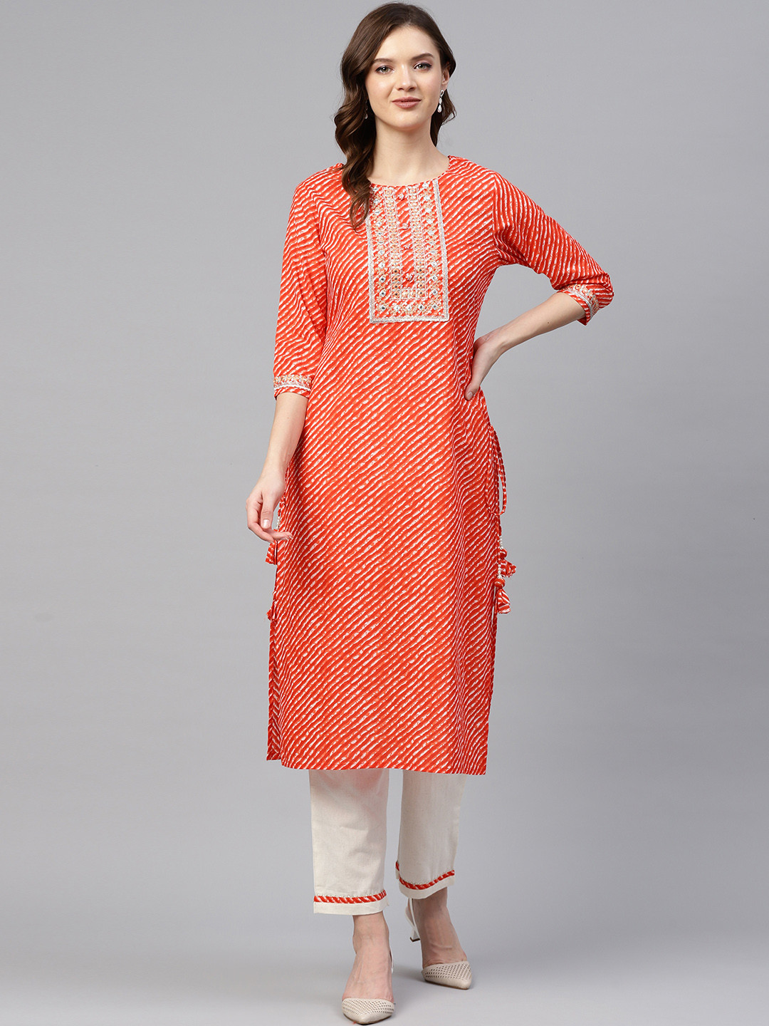 

Readiprint Fashions Women Orange Leheriya Printed Regular Kurta with Trousers