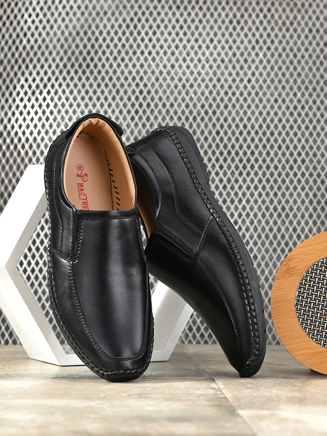 

Mactree Men Black Solid Formal Slip On Shoes