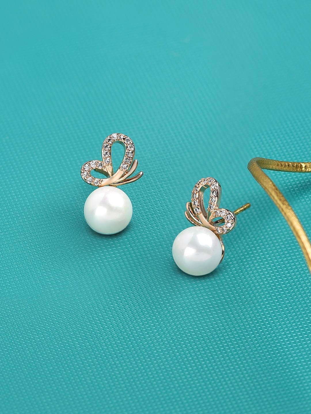

Zaveri Pearls Rose Gold Contemporary Studs Earrings
