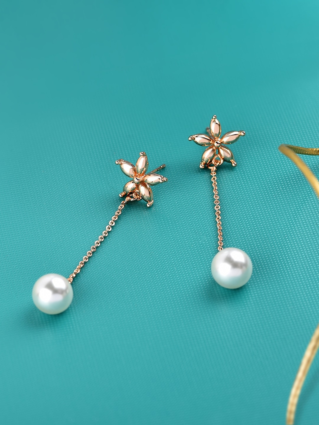 

Zaveri Pearls Rose Gold Star Shaped Drop Earrings