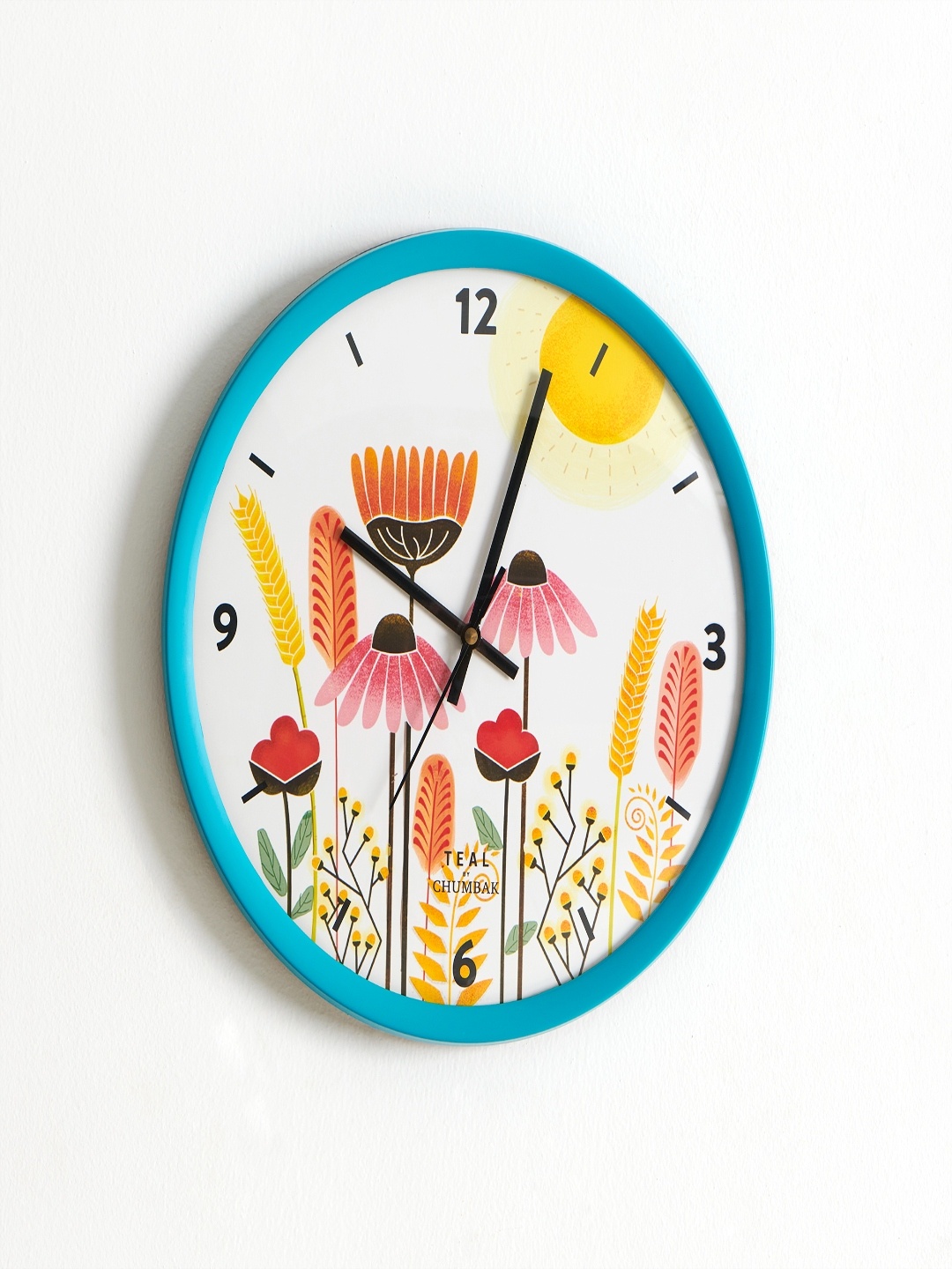 

Chumbak Turquoise Blue & White Printed 30 cm x 38 cm Contemporary Wall Clock