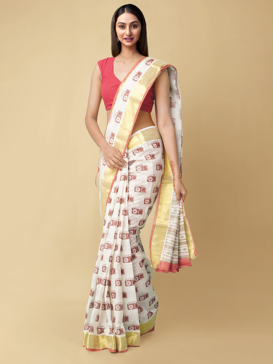 

Unnati Silks White & Rust Zari Pure Cotton Kasavu Saree