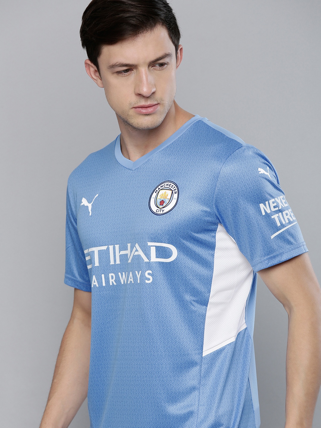 

Puma Men Blue Manchester City Printed V-Neck Football T-shirt
