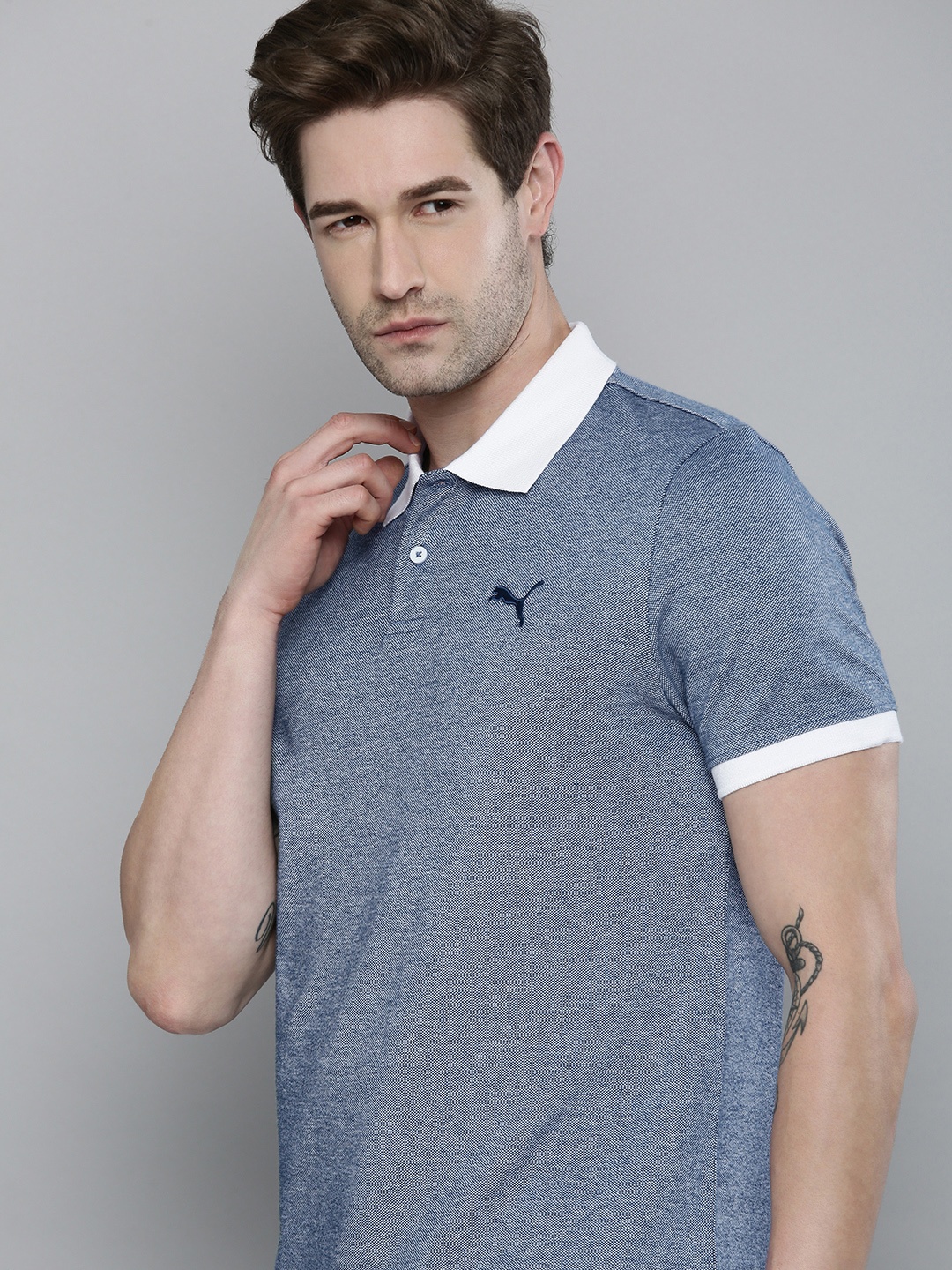 

Puma Men Blue White Solid Polo Collar Pure Cotton T-shirt