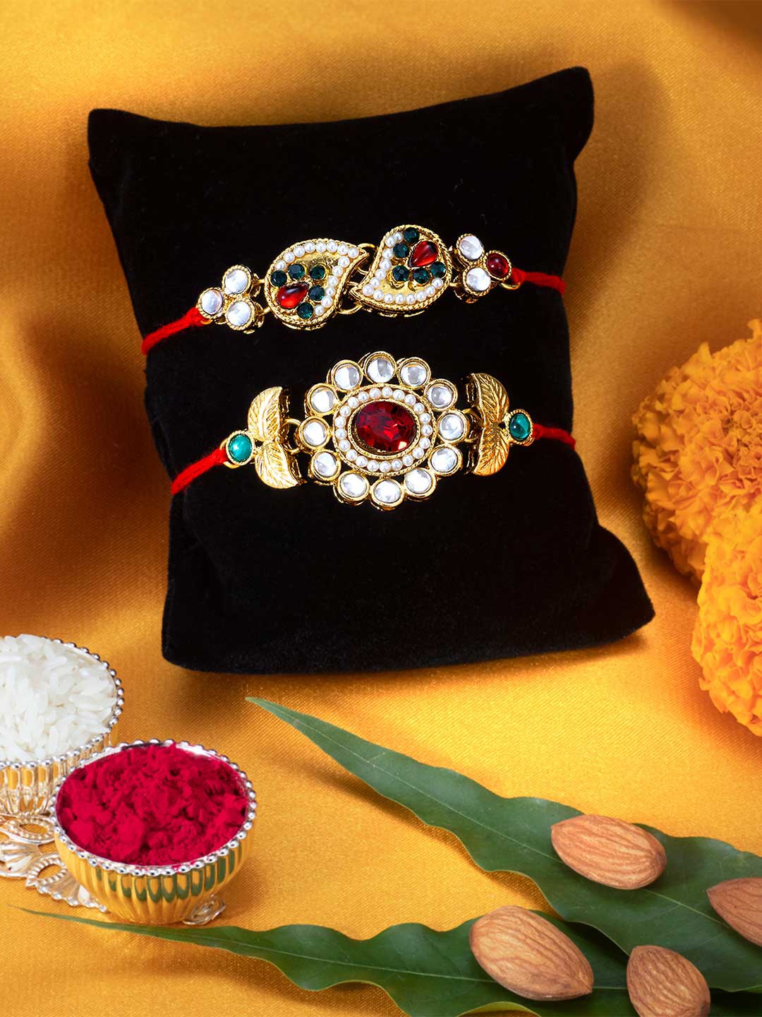 

Peora Set of 2 Handmade Kundan Rakhi with Raksha Bandhan Greeting Card & Roli Chawal, Red