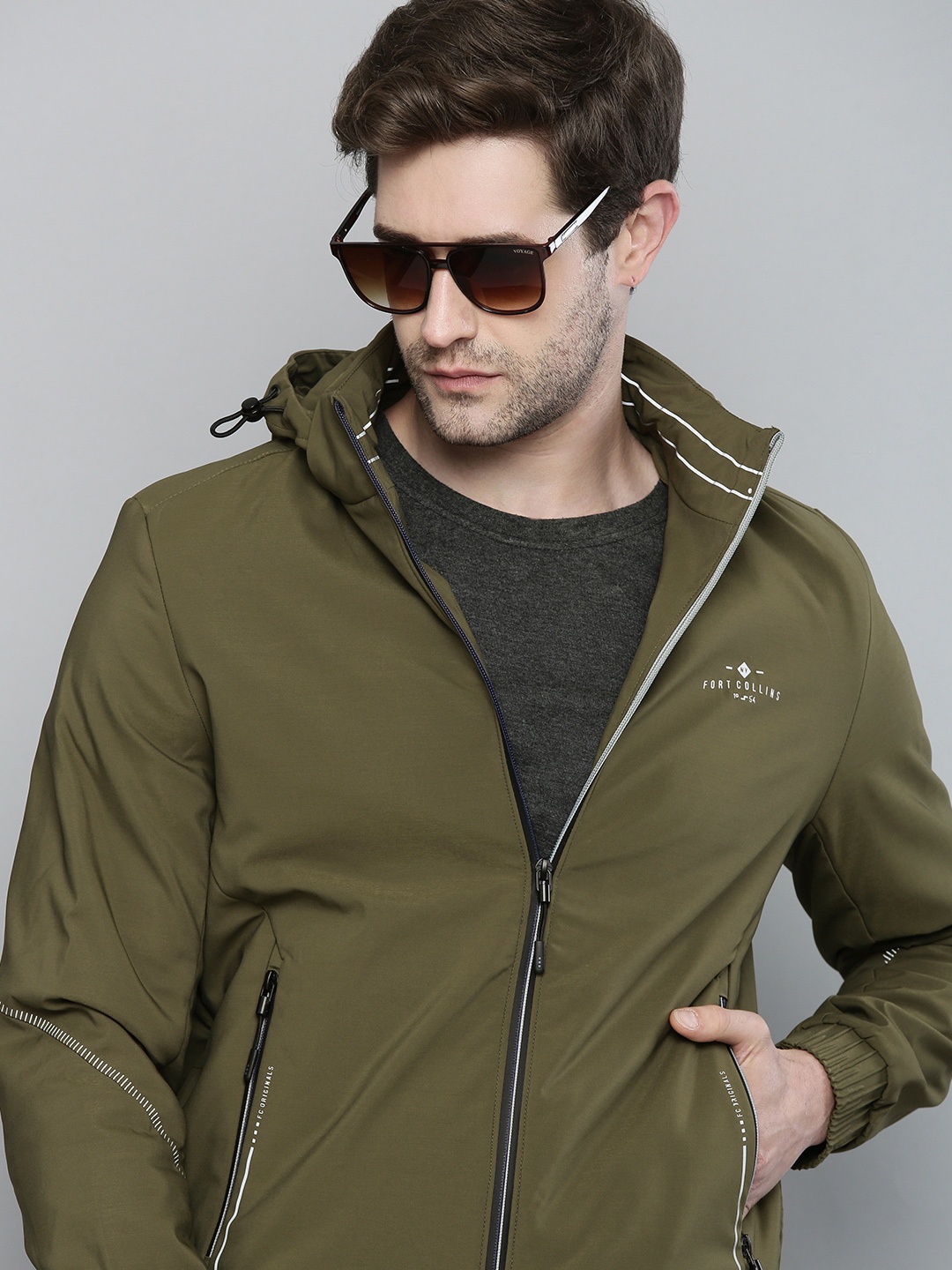 

Fort Collins Men Olive Green Solid Lightweight Outdoor Sporty Jacket