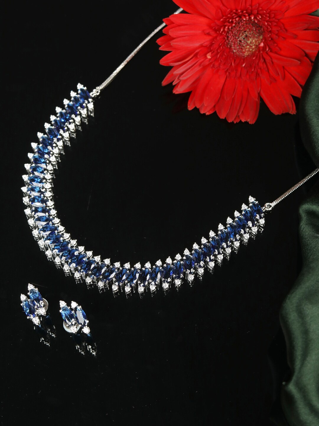 

Priyaasi Women Silver-Plated Blue & White AD-Studded Handcrafted Jewellery Set