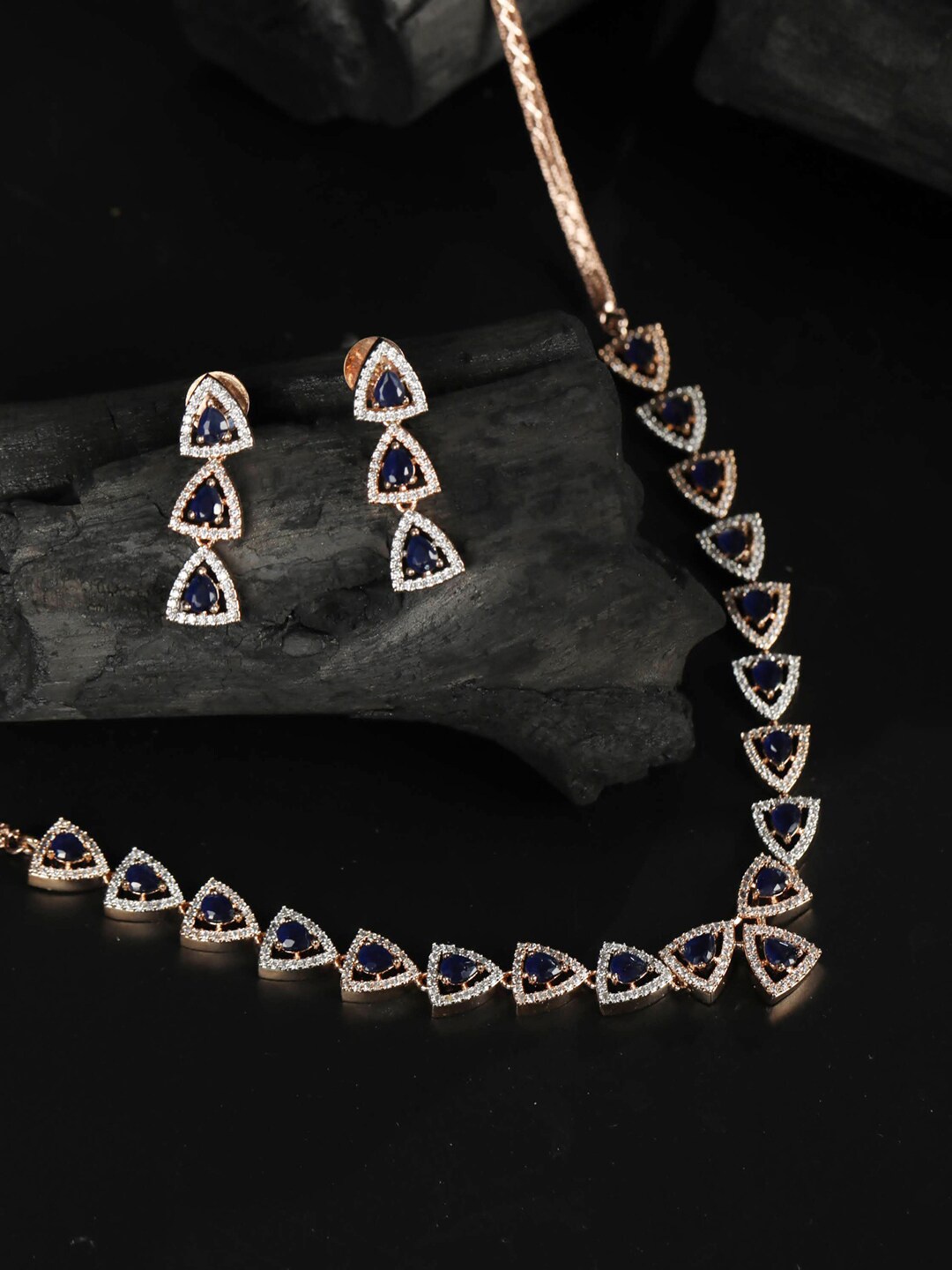 

Priyaasi Women Rose Gold-Plated Navy Blue & White AD-Studded Handcrafted Jewellery Set
