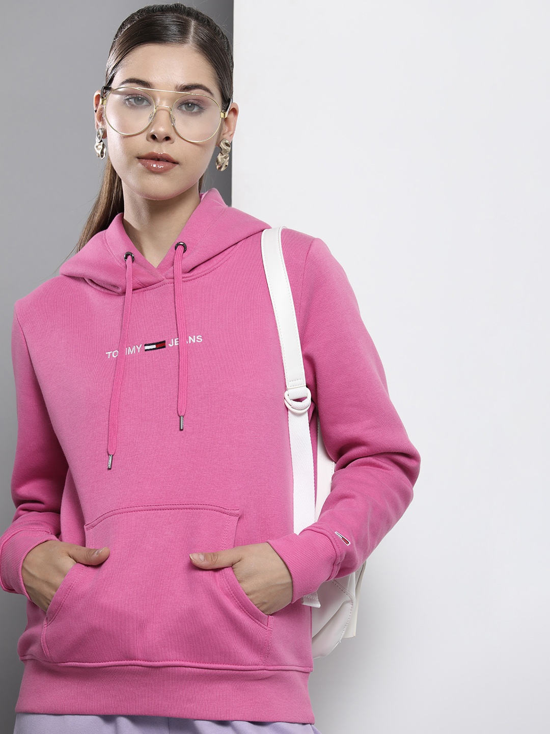 

Tommy Hilfiger Women Pink Solid Hooded Sweatshirt