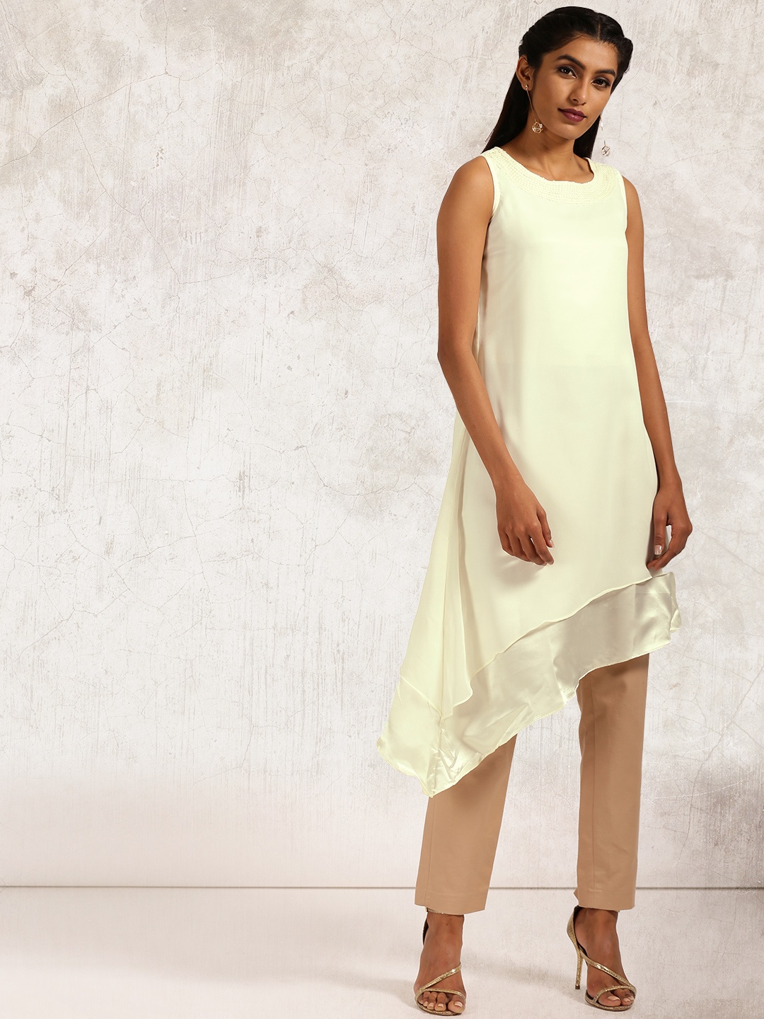 

Anouk Women Off-white Solid Asymmetric Hemline A-Line Kurta