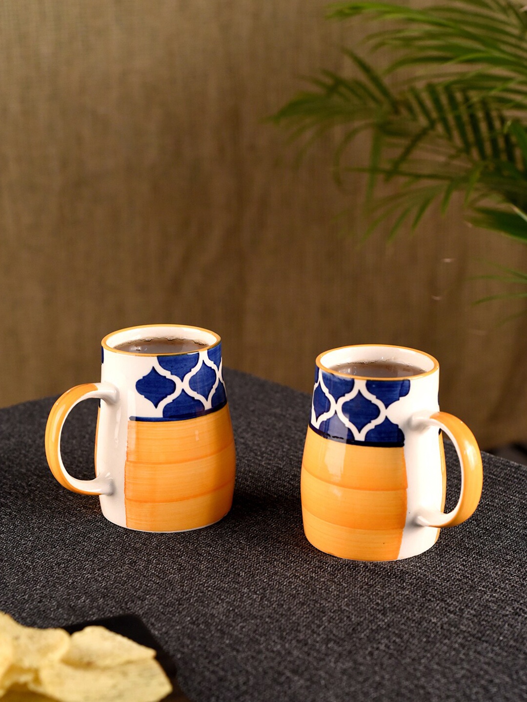 

Unravel India Multicoloured Handcrafted Printed Ceramic Glossy Mugs Set of 2 Mugs, Multi