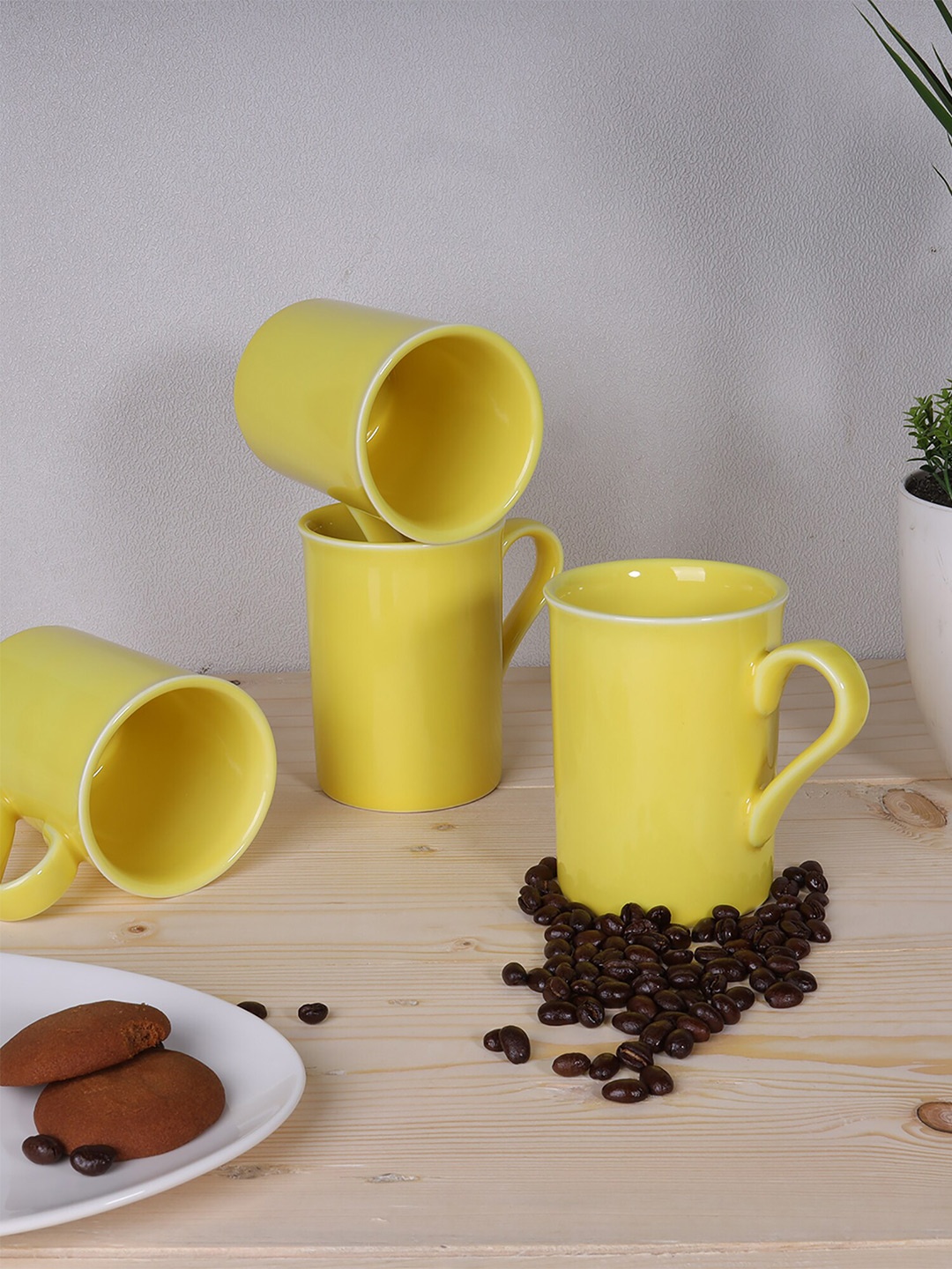 

Ariane Yellow Set of 4 Handcrafted Solid Porcelain Glossy Mugs