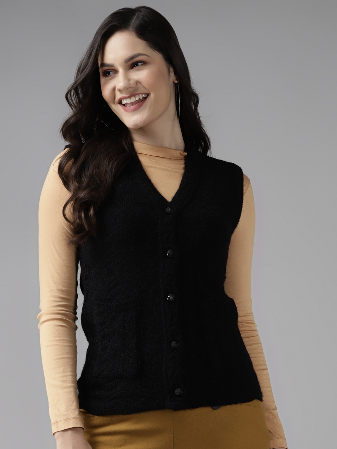 

Cayman Women Black Self-Design Woollen Sweater Vest