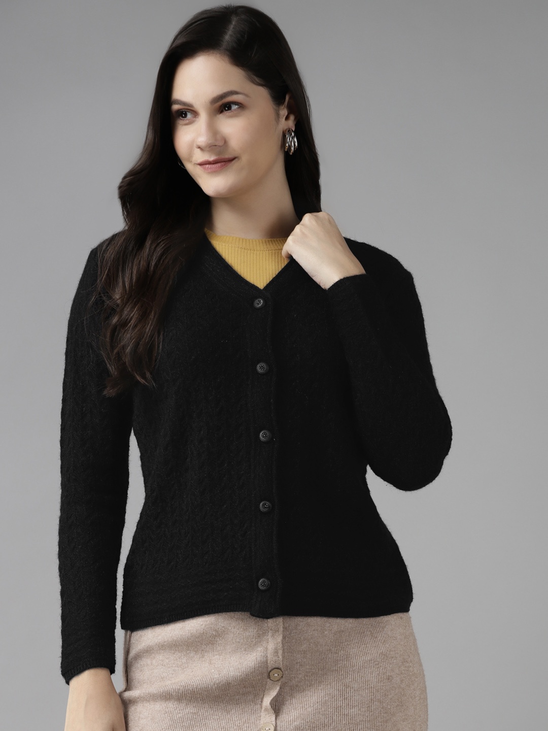 

Cayman Women Black Woollen Self Design Cardigan