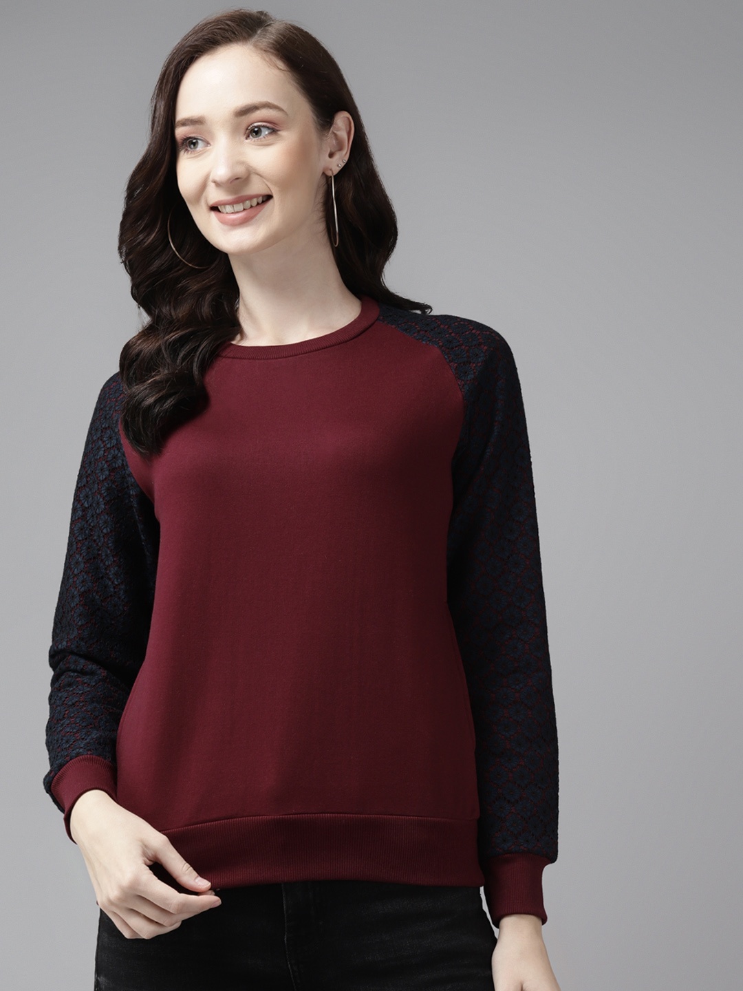 

Cayman Women Maroon Solid Sweatshirt