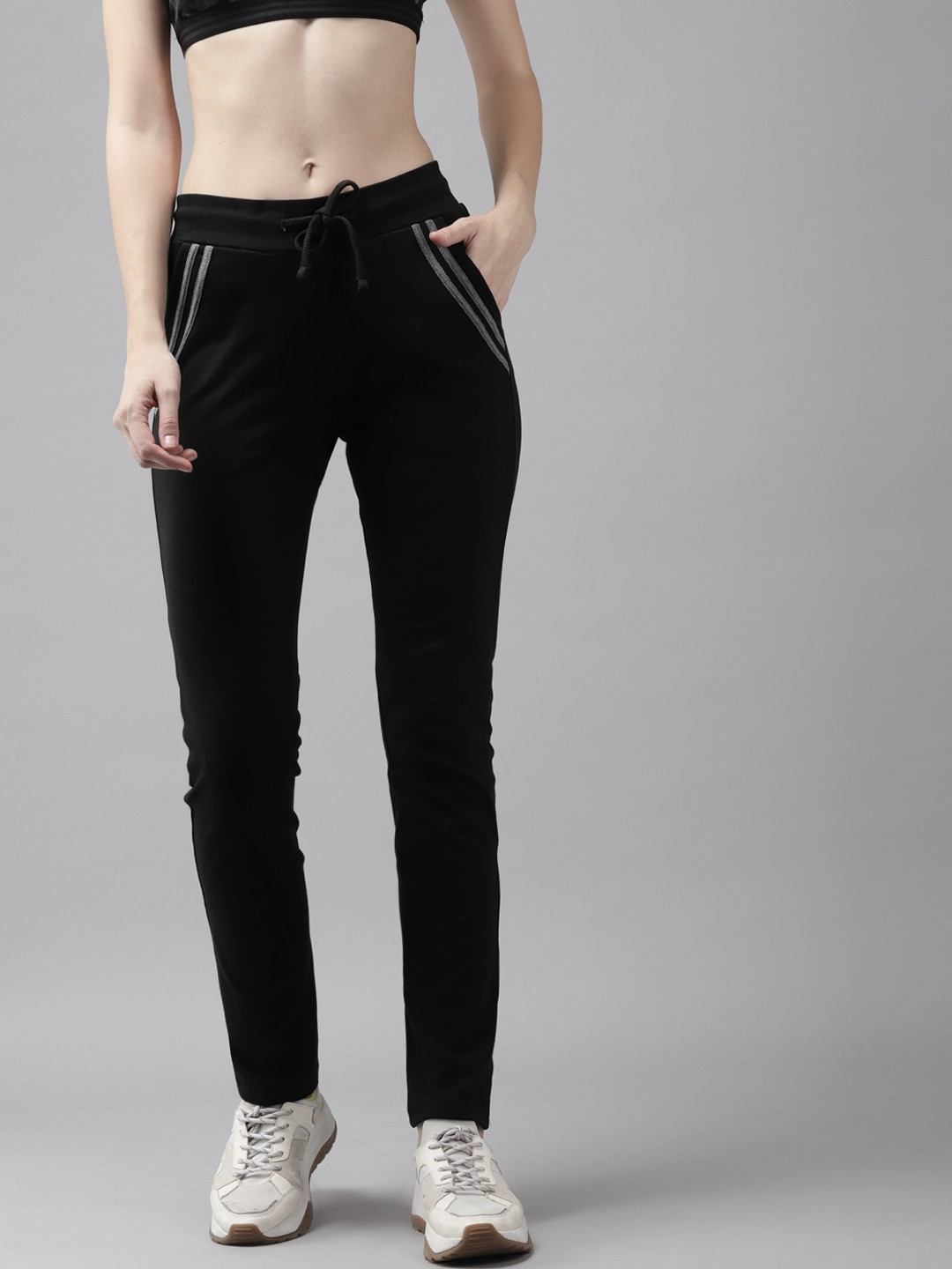 

Cayman Women Black Solid Track Pants