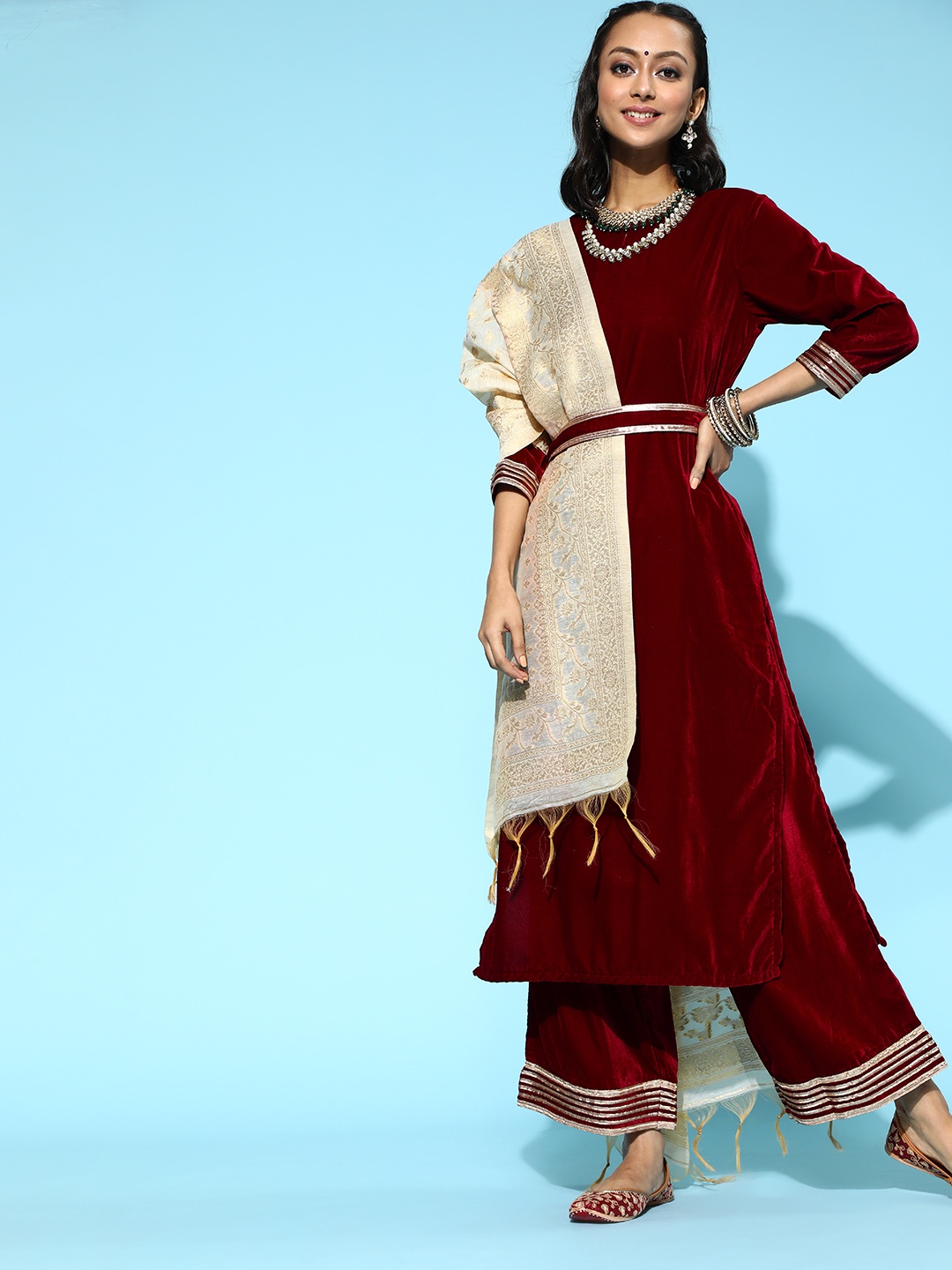 

Indo Era Women Maroon Regular Velvet Kurta Set With Dupatta and Belt Set
