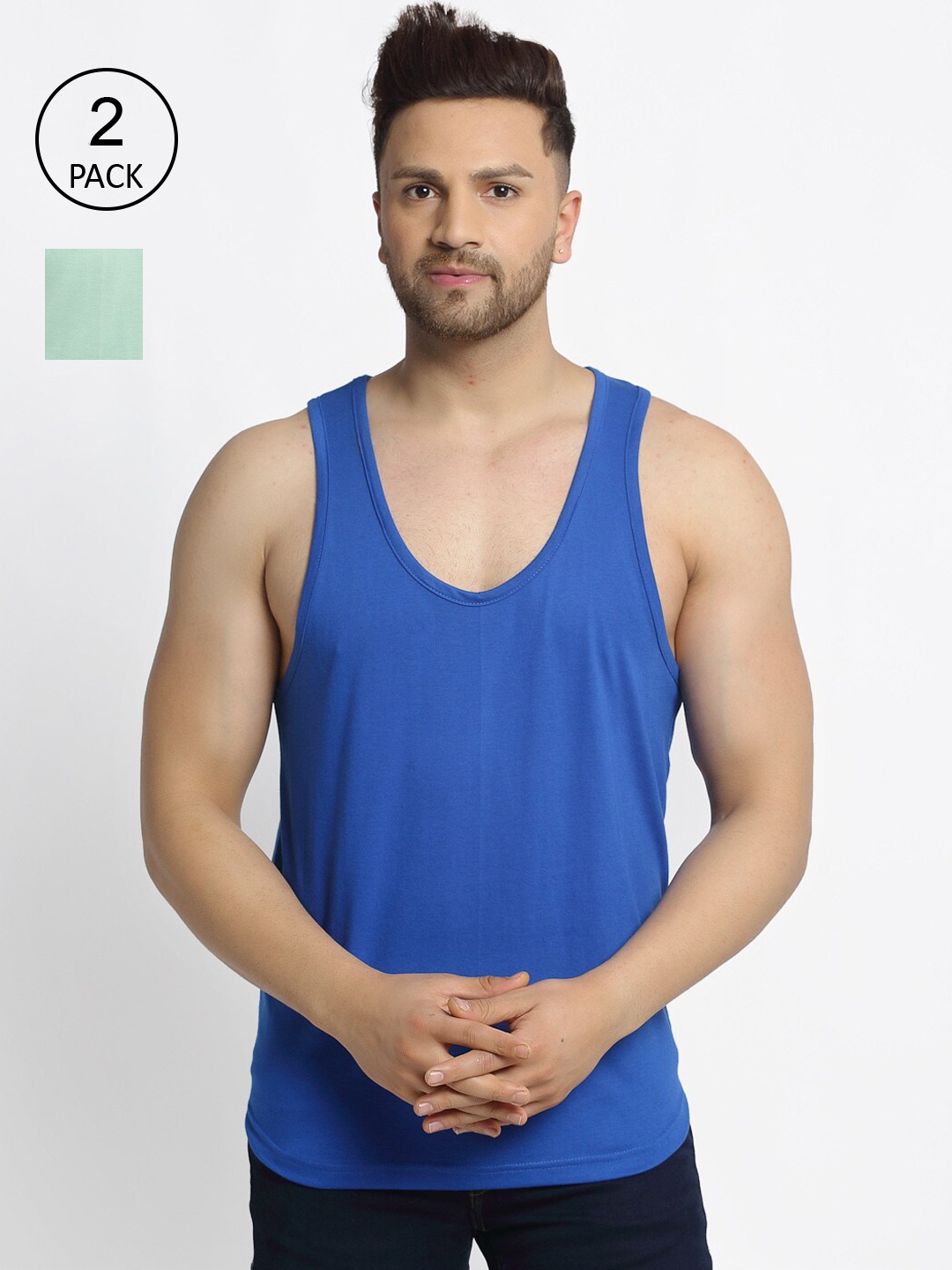 

Friskers Men Pack Of 2 Blue and Sea Green Solid Pure Cotton Gym Vests