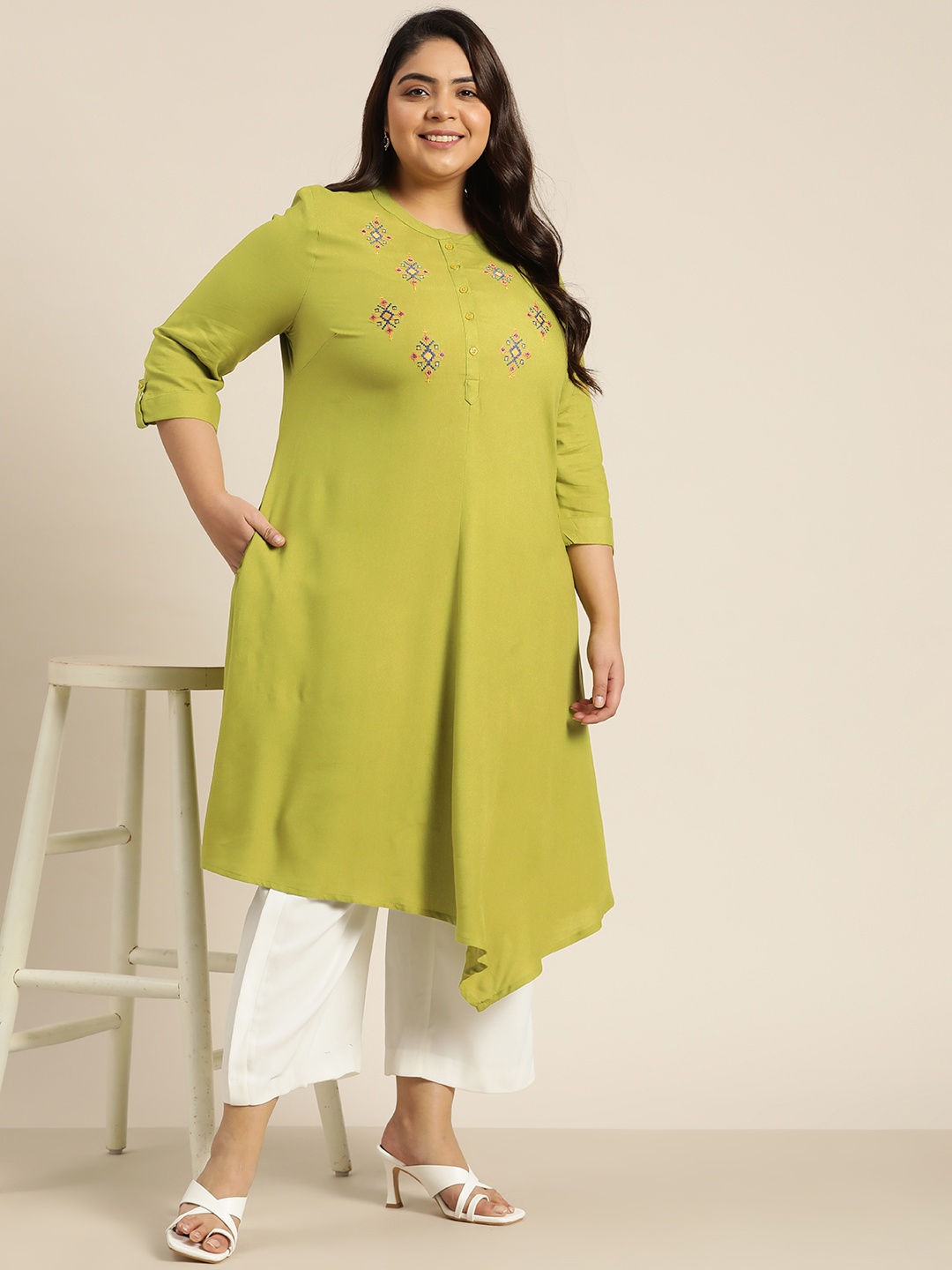 

Sztori Women Green Ethnic Motifs Thread Work Pleated Asymmetric EcoVero Kurta