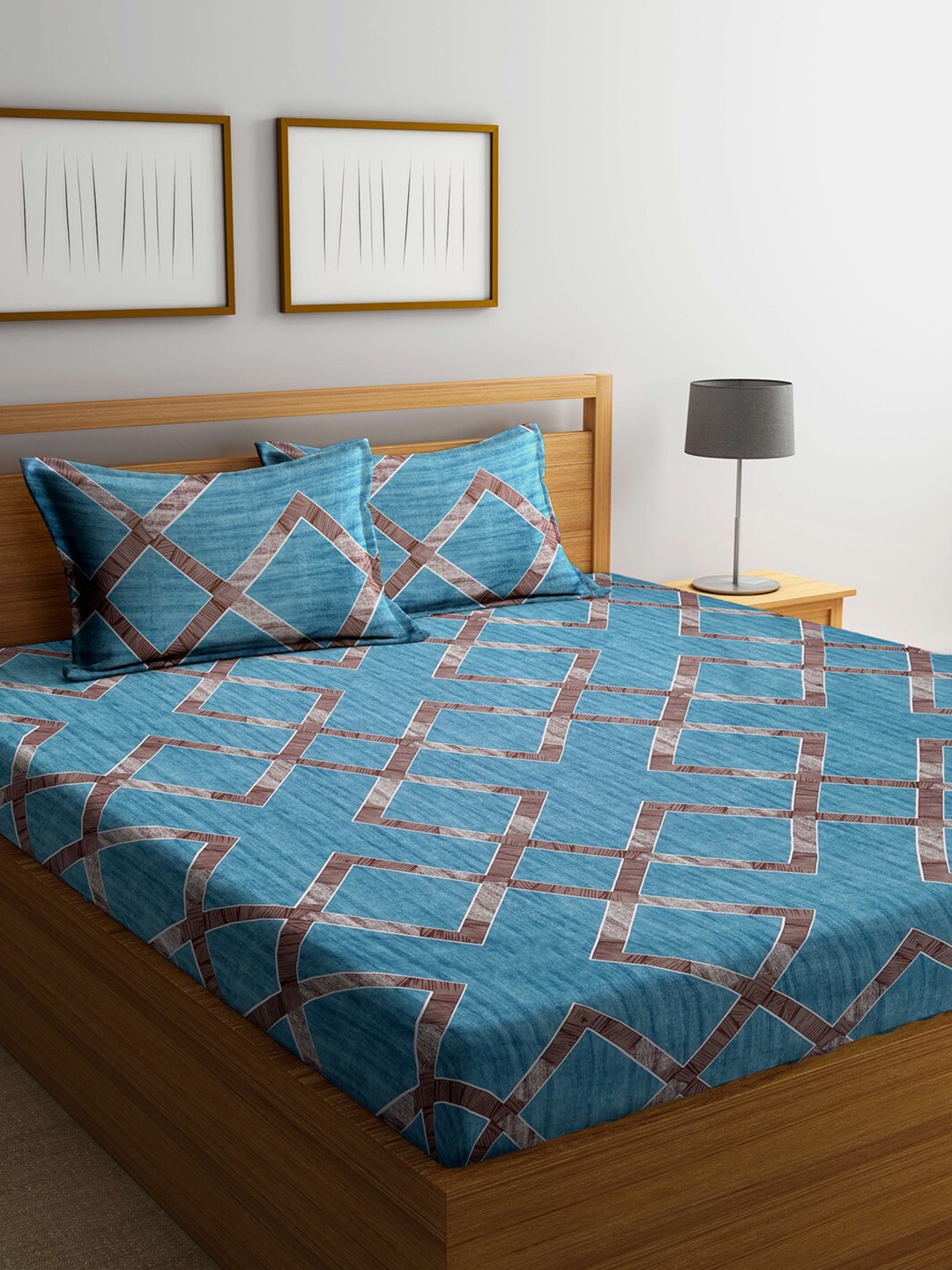 

Klotthe Turquoise Blue 210 TC Printed Cotton Blend King Size Bedsheet With 2 Pillow covers